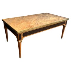 Neoclassical style patinated wood and brass coffee table with marble top