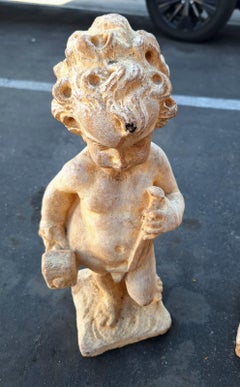 Neoclassical style sculpture of a Cherub carved in Limestone