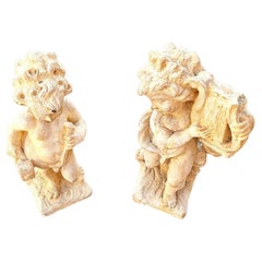 Neoclassical style sculpture of a Cherub carved in Limestone