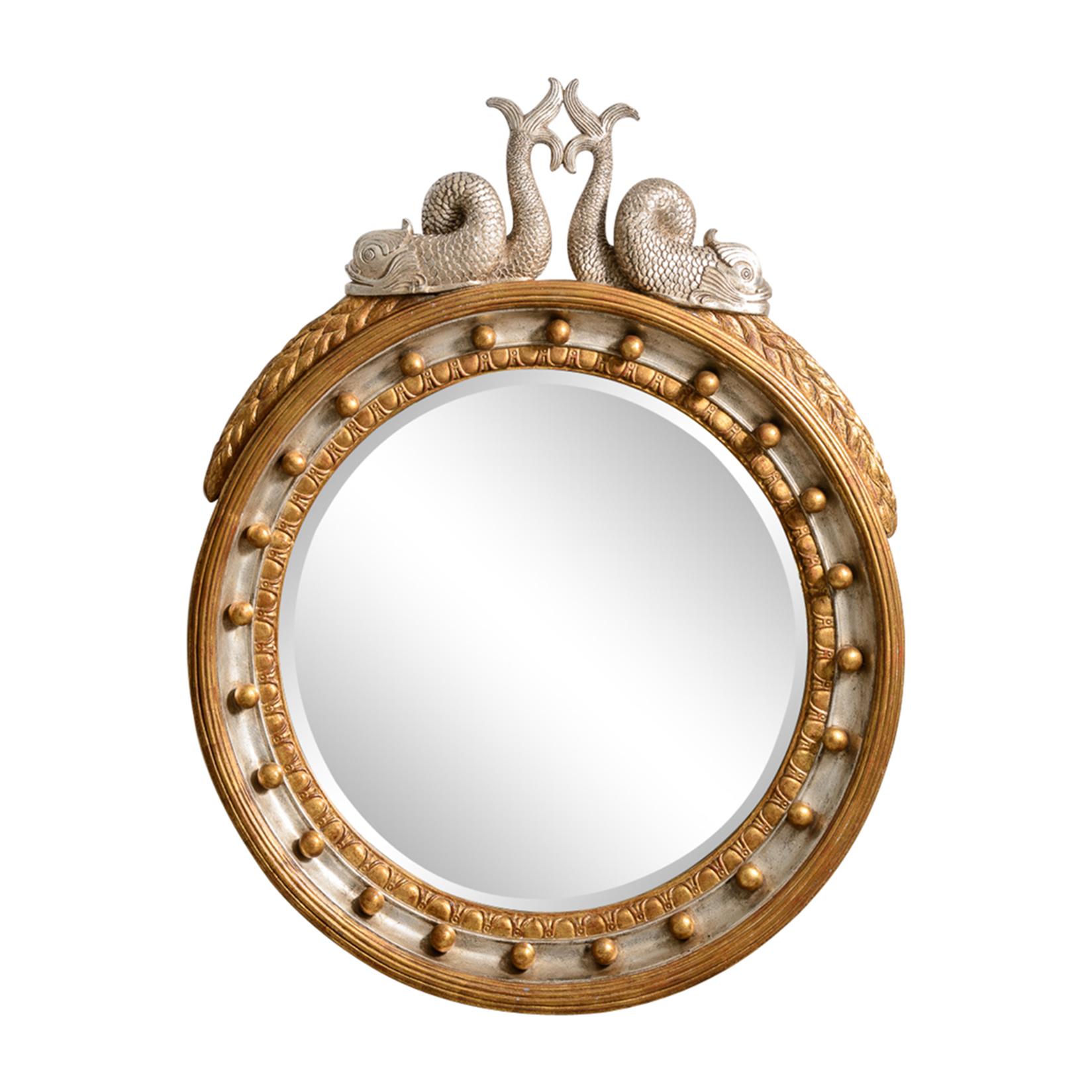 Just in, this quite fabulous and heavy Gilt and Silver Wood mirror in the  Hollywood Regency Style with a pair of Huge Silver & Gold Dolphin at the top.
Many of these mirrors are made of Foam, and are very light
This mirror is solid wood and quite