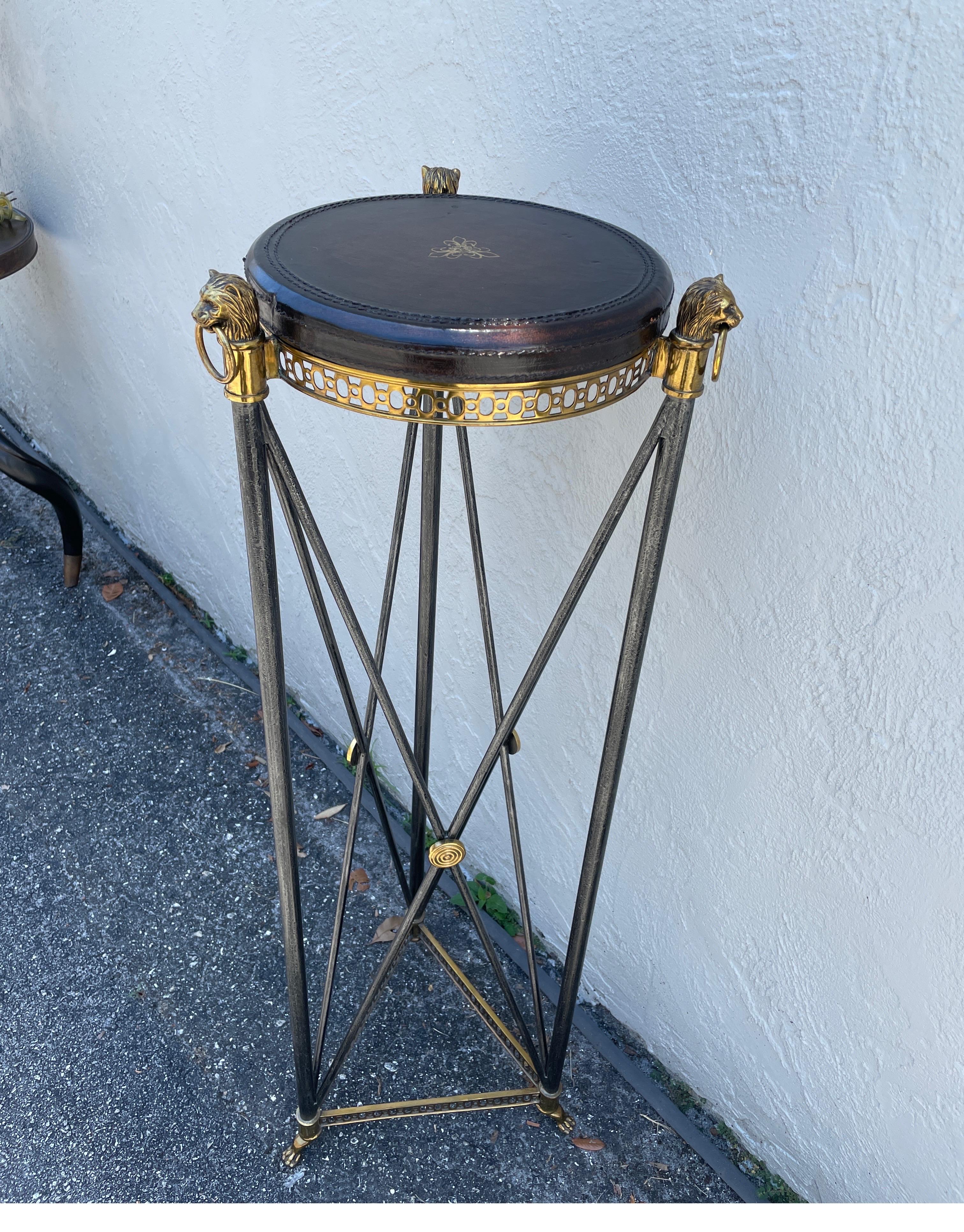 Steel & brass neoclassical pedestal with embossed leather top, lion head rings & paw feet.