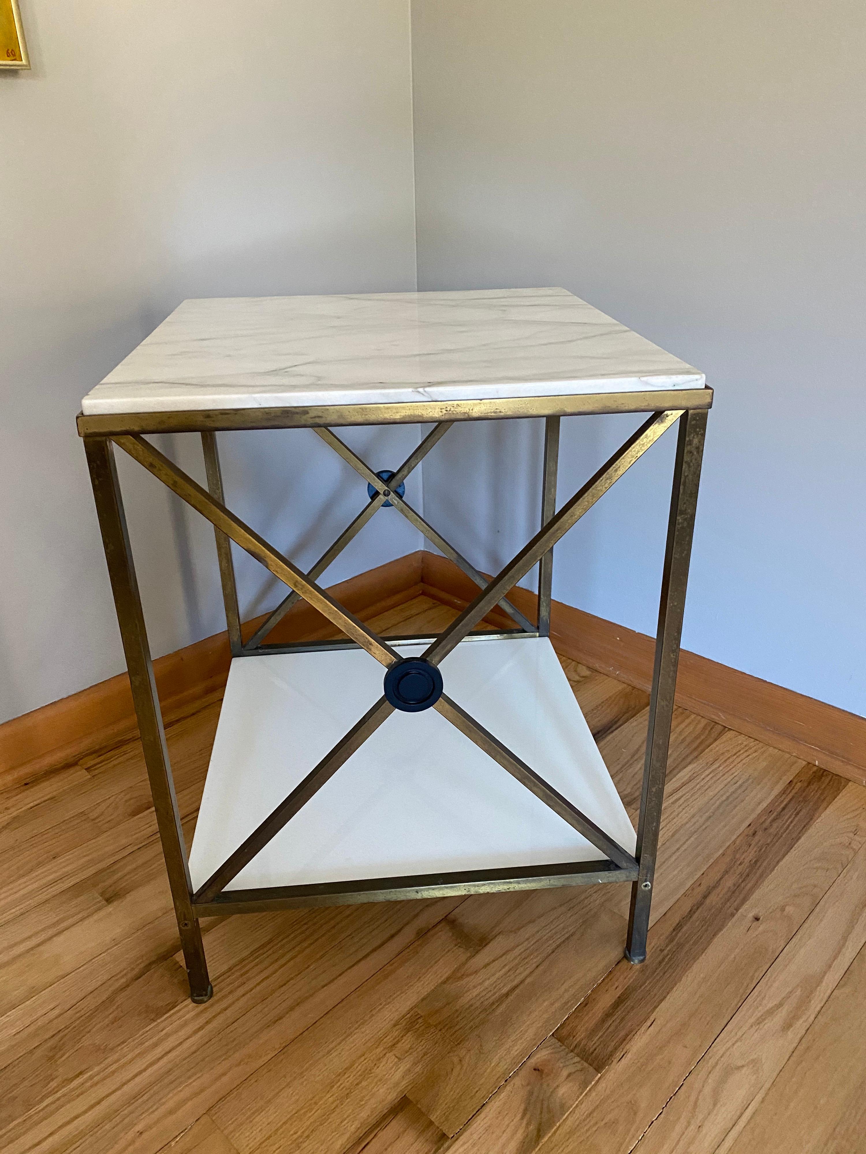 A quality mid-20th century neoclassical style brass table with white marble top and opaque white glass lower shelf.