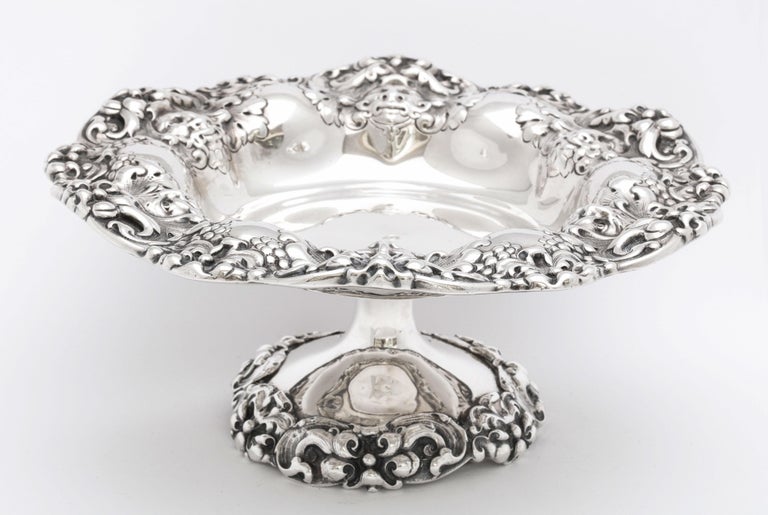 Neoclassical style, Victorian period, sterling silver tazza, Gorham Manufacturing Co., Providence, Rhode Island, year hallmarked for 1901. Decorated with grapes and mythological faces. Measures 3 1/2 inches high x 8 1/2 inches diameter across bowl x