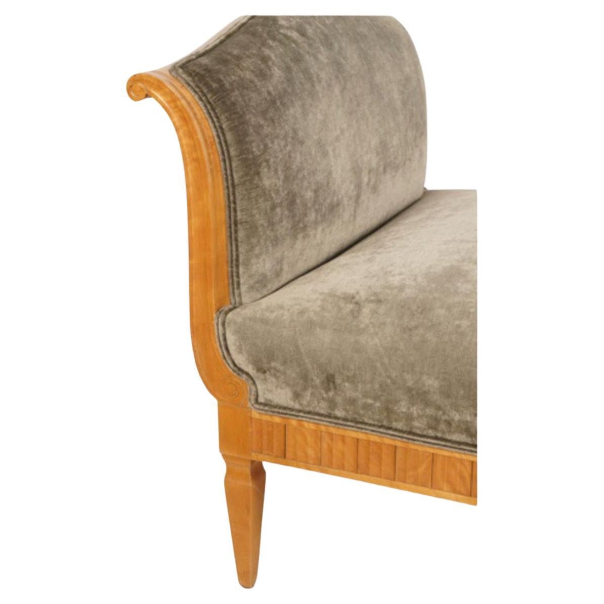 This is a superb example of the neoclassical daybed or recamier that dates to the Swedish Biedermeier Period. The recamier is in overall very good condition. It is upholstered in a neutral deep sage silk blend velvet, although not new, the
