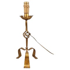 neoclassical table lamp in golden wrought iron circa 1950