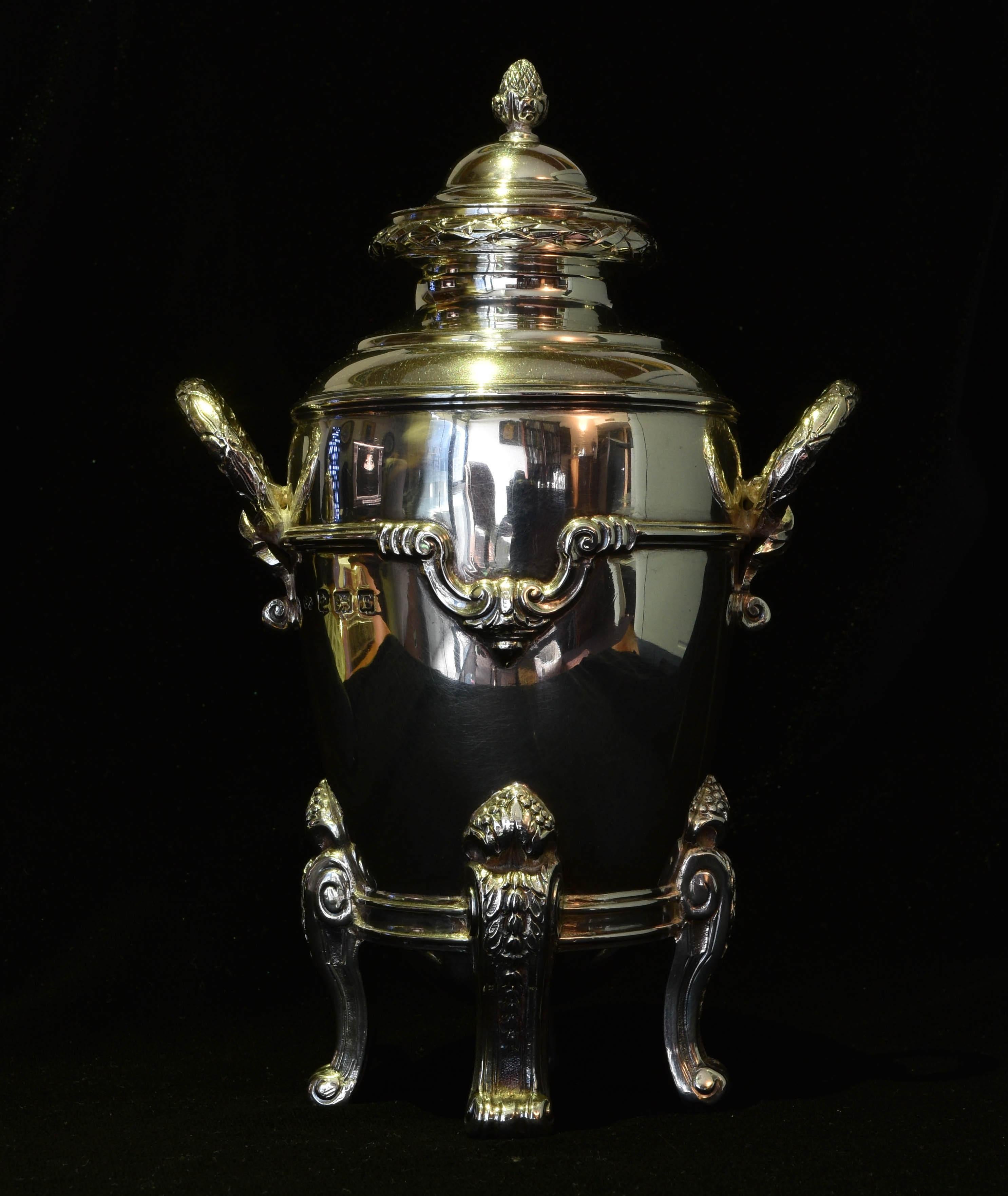 A splendid tea canister the neoclassical style, by Elkington, one of the best of teh English silversmiths of the period. The work is deep, crisp and detailed, and the item is in excellent condition.

Fully hallmarked.