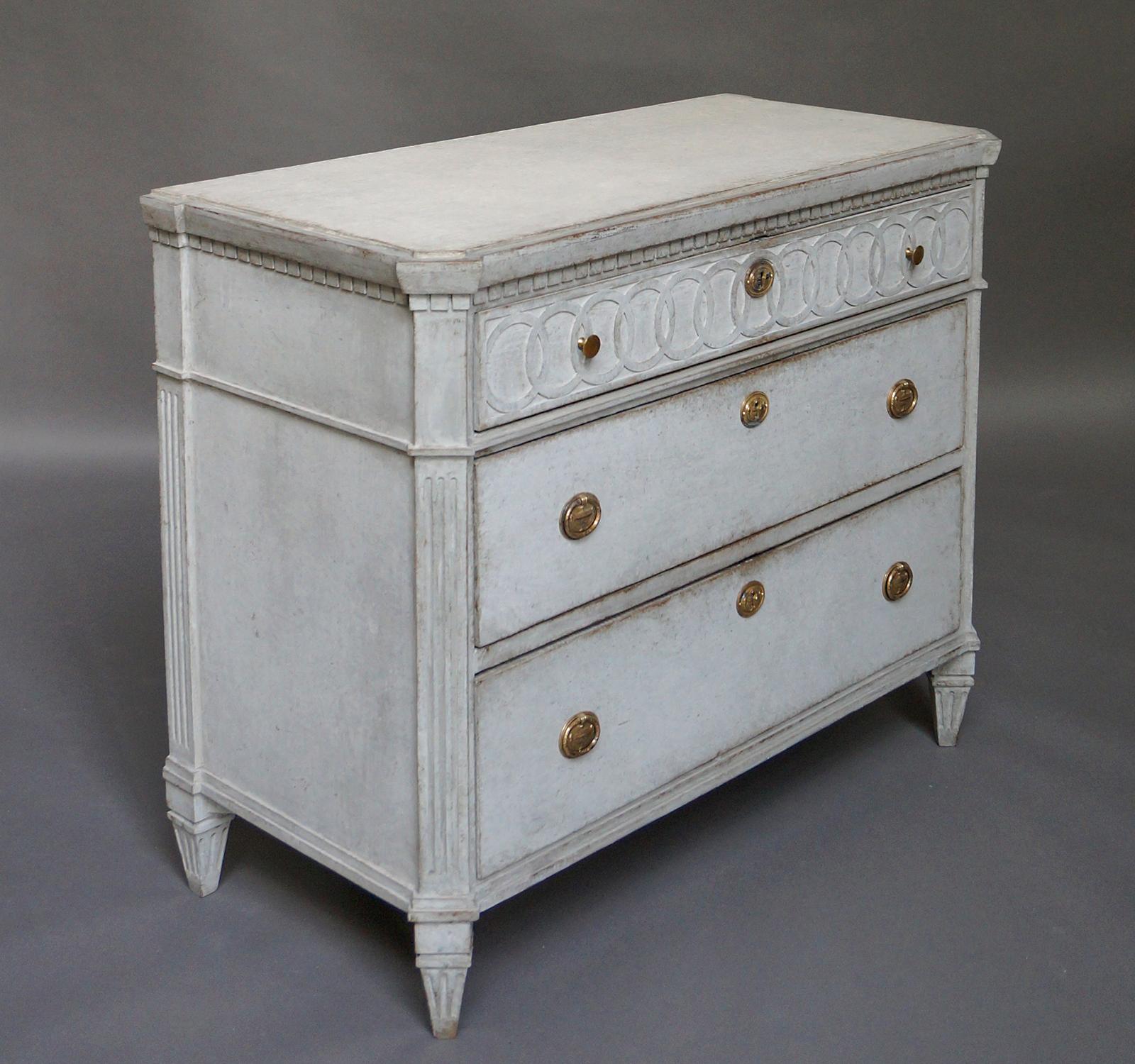 Carved Neoclassical Three-Drawer Commode