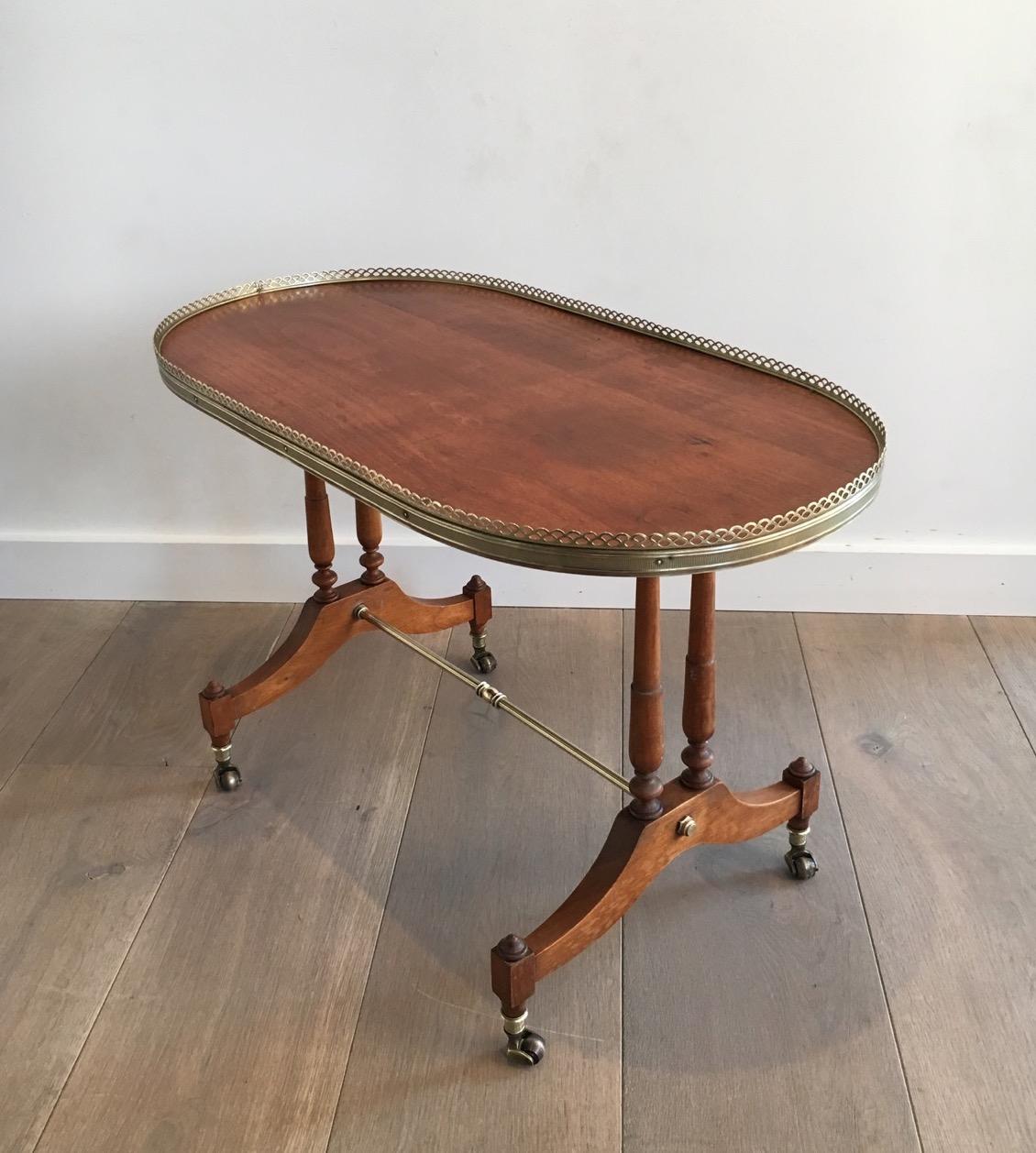 Neoclassical Wood and Brass Oval Coffee Table, circa 1940 5
