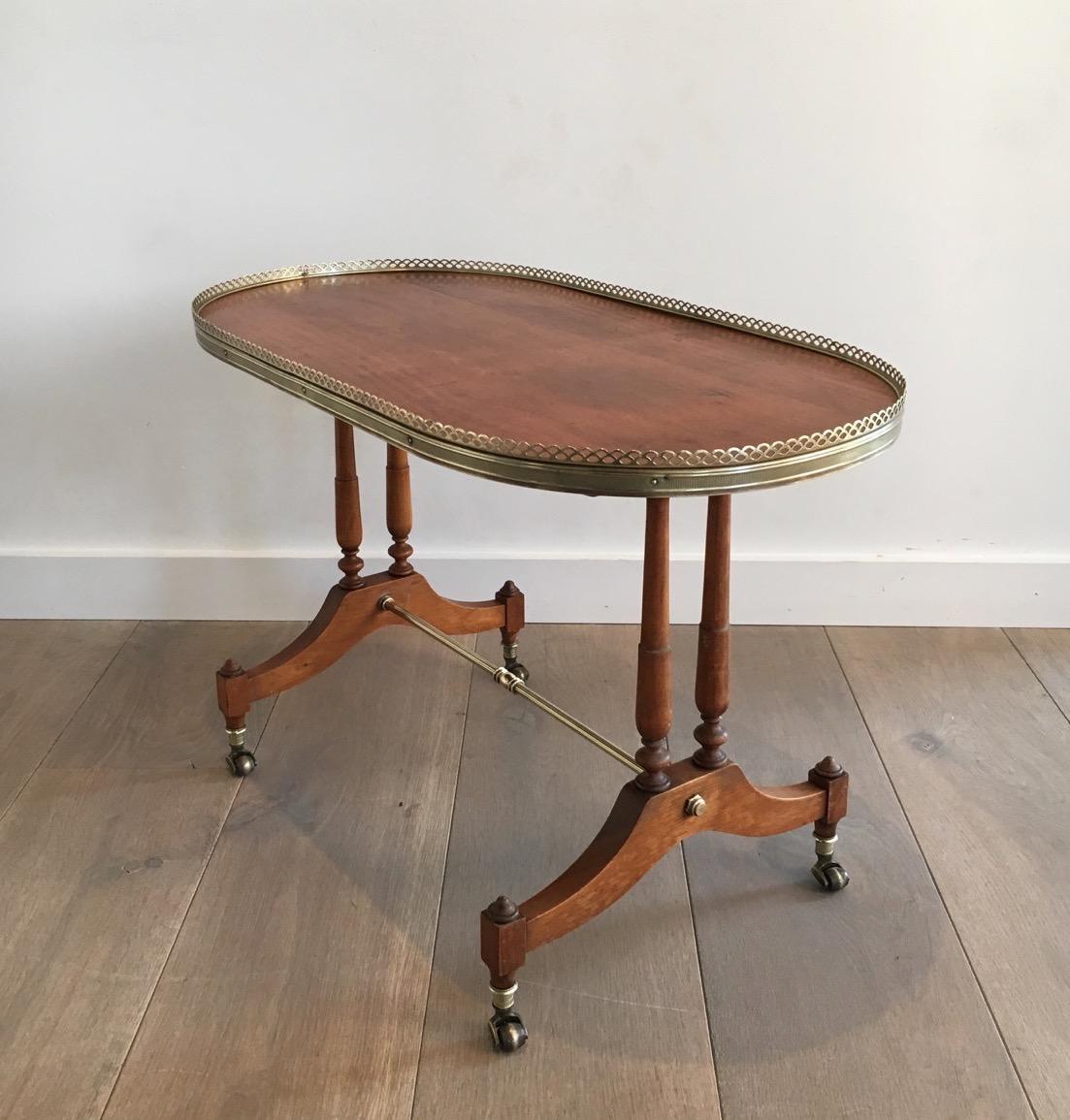 French Neoclassical Wood and Brass Oval Coffee Table, circa 1940