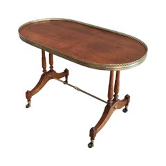 Neoclassical Wood and Brass Oval Coffee Table, circa 1940