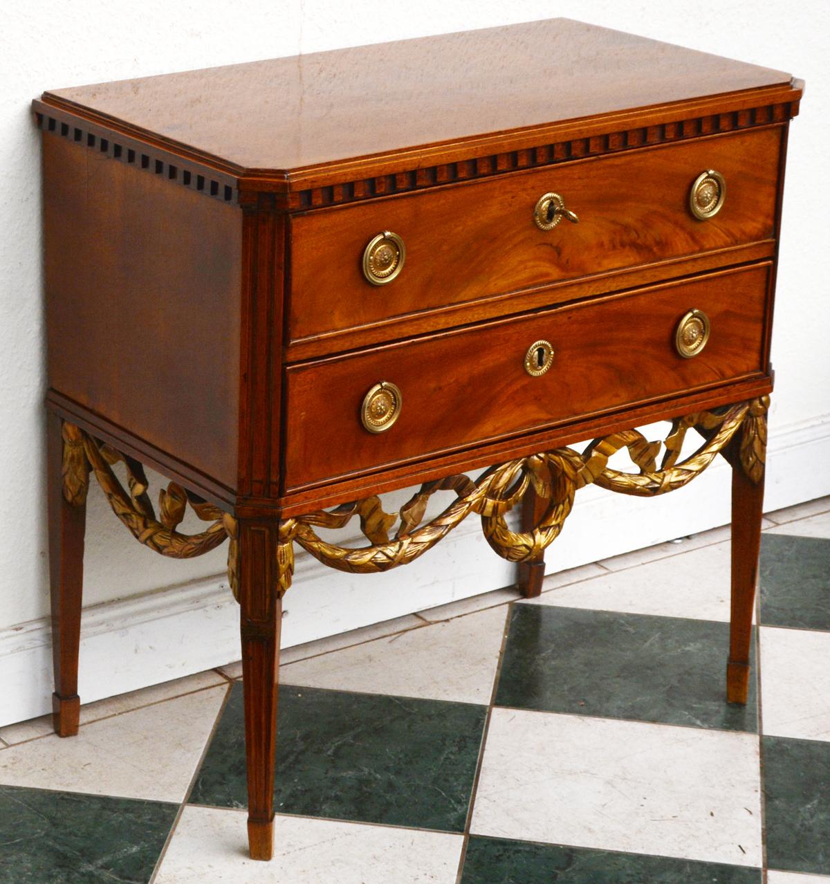 Neoclassicism dresser, Altona, Hamburg, Germany, 1800s. Made of mahogany. Rare, typical local design. 

High, tapered square legs on foot blocks. Body with chamfered sides. Gold-plated grip rings and fittings. Gilded frame carving in the form of a
