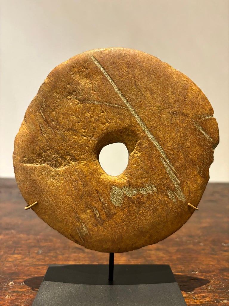 Neolithic Carved Stone Disc Mounted on a Steel Base 2-3000 BC Neolithic Carved Stone Disc Mounted on a Steel Base 2-3000 BC