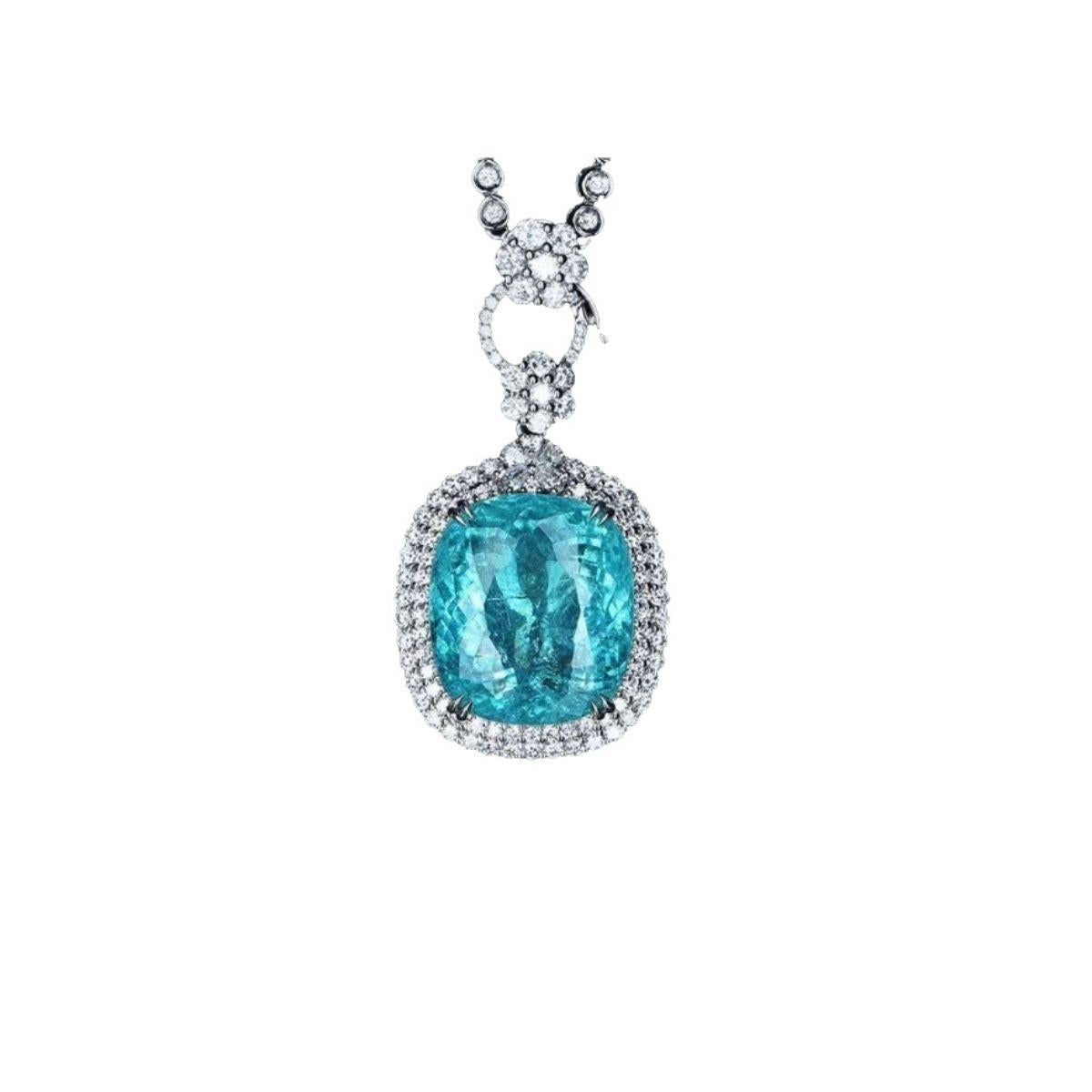 This is a Extremely rare Neon Blue Paraiba Tourmaline Necklace  20.17 ct  with 90 diamonds set in 18k White Gold


The story of this neon-bright tourmaline’s discovery is as intriguing as the stone itself. Hidden for many years beneath hills in the