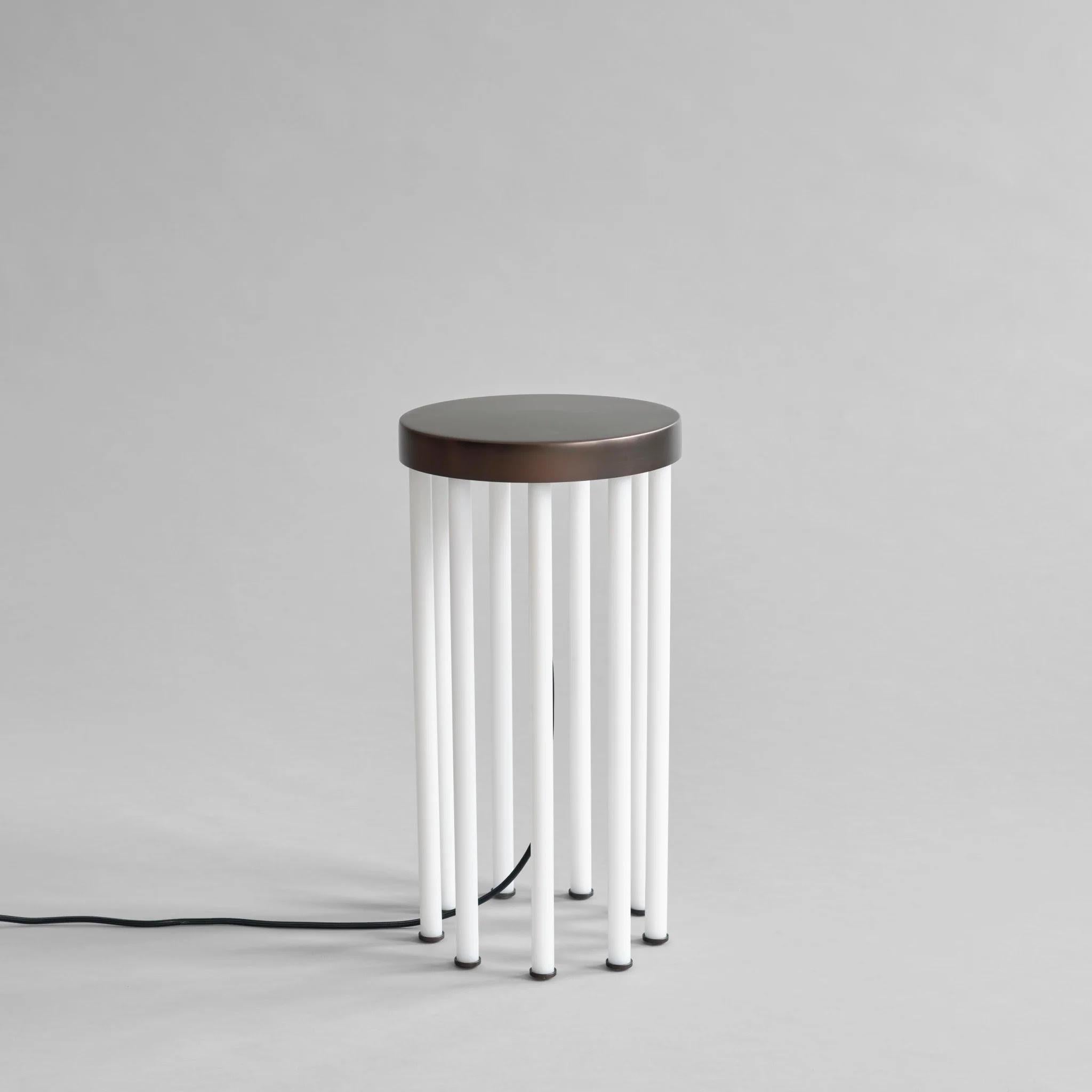 Neon Bronze side table, contemporary work

The Neon table is inspired by the neon aesthetic of the 80s. Its bronze-plated tabletop is elegantly supported by nine radiant legs made from immaculate white acrylic tubes. The Neon table features an