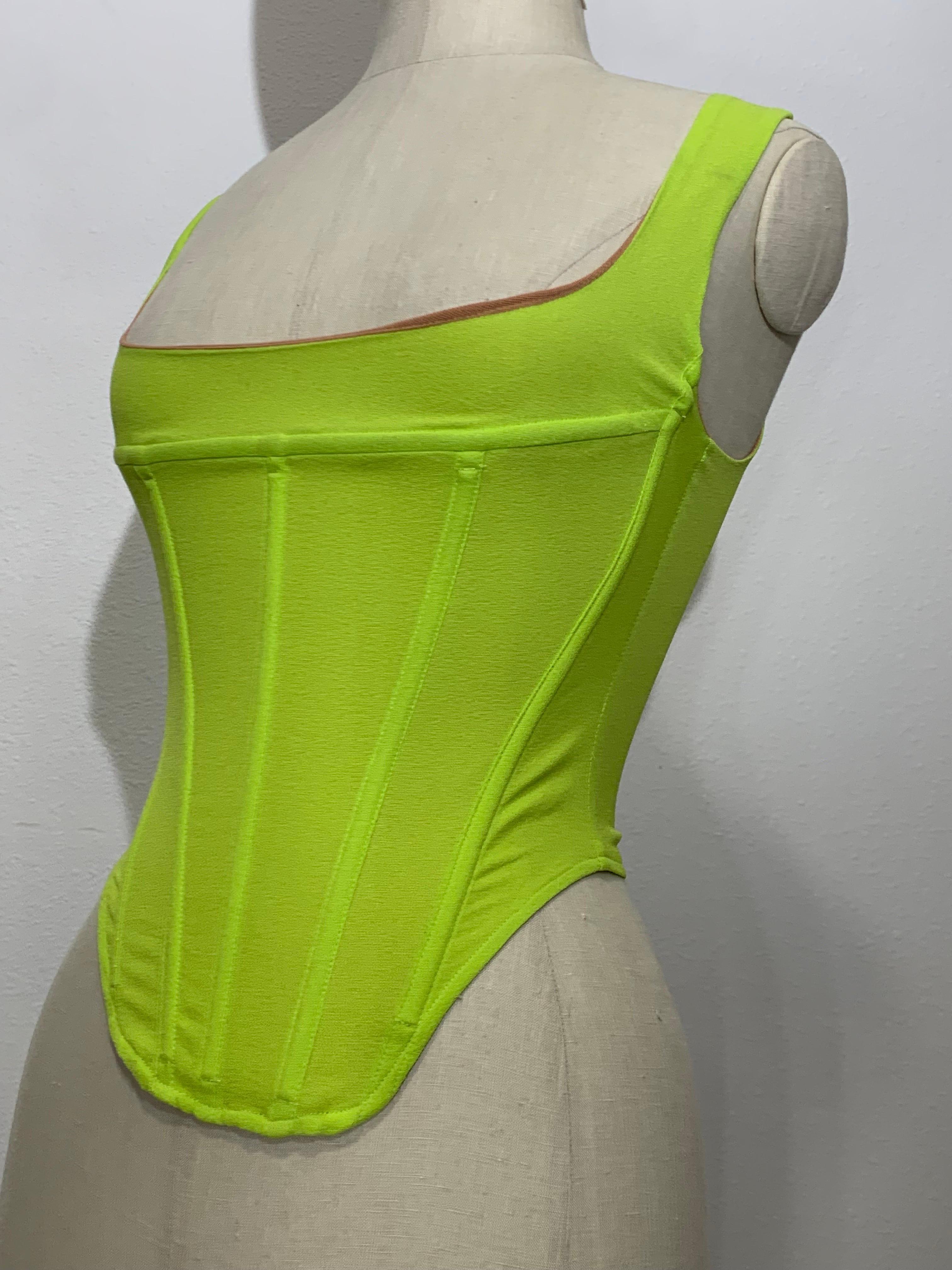 Neon Green Elasticized Mesh Corset w Boning and Full Back Zipper:  Low-cut squared décolletage. Stomacher front is boned with a round low front point. Nude mesh lining. Size Extra Small. 