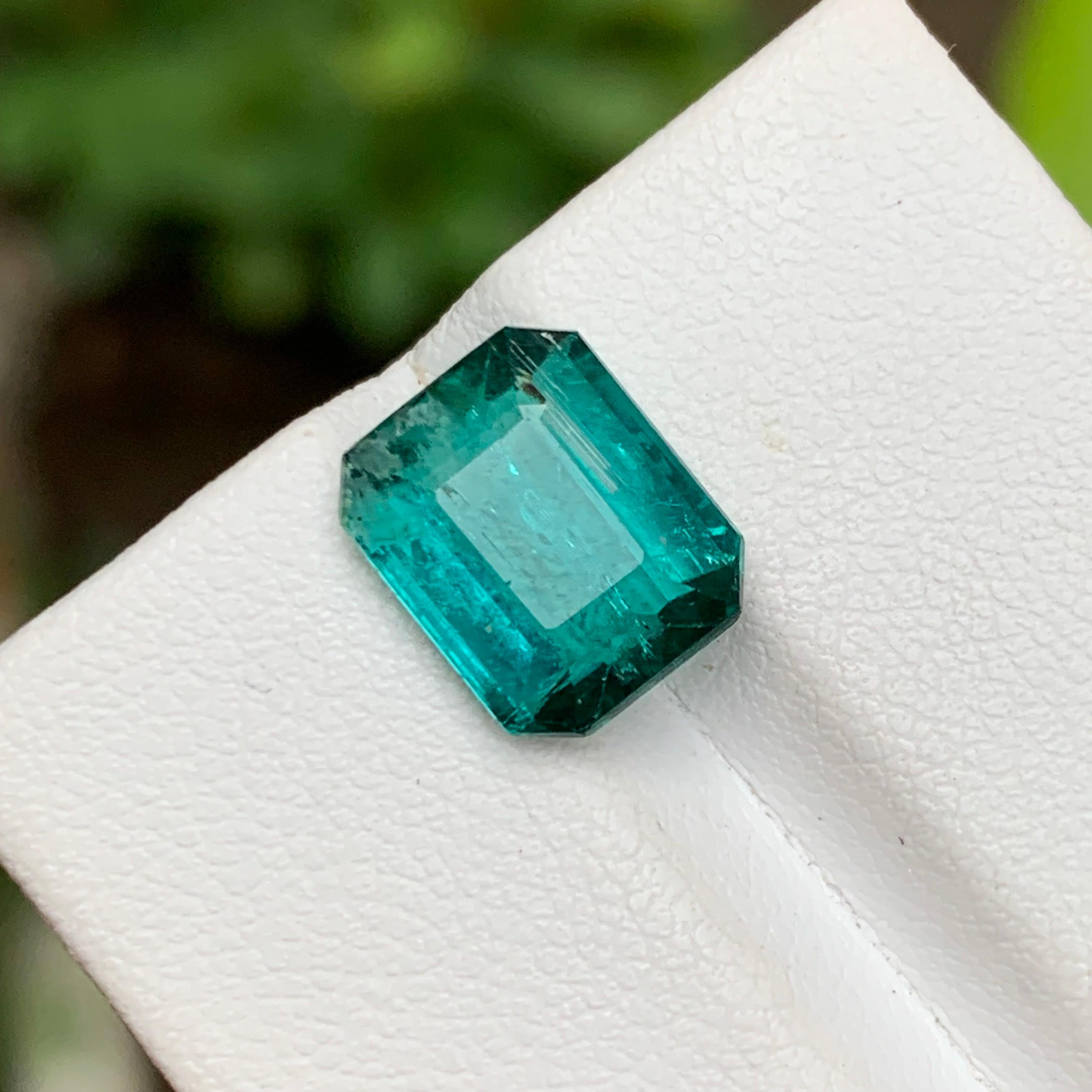 Neon Greenish Hue Blue Tourmaline Loose Gemstone Emerald Cut from Afghanistan!!

💎 GEMSTONE TYPE: Tourmaline
⚖️ WEIGHT: 4.00 Carats
🪚 SHAPE & CUT: Emerald Cut
📏 SIZE (MM): 10.72 x 8.75 x 4.91
🌈 COLOR: Neon Greenish Hue Blue
🔎 CLARITY: