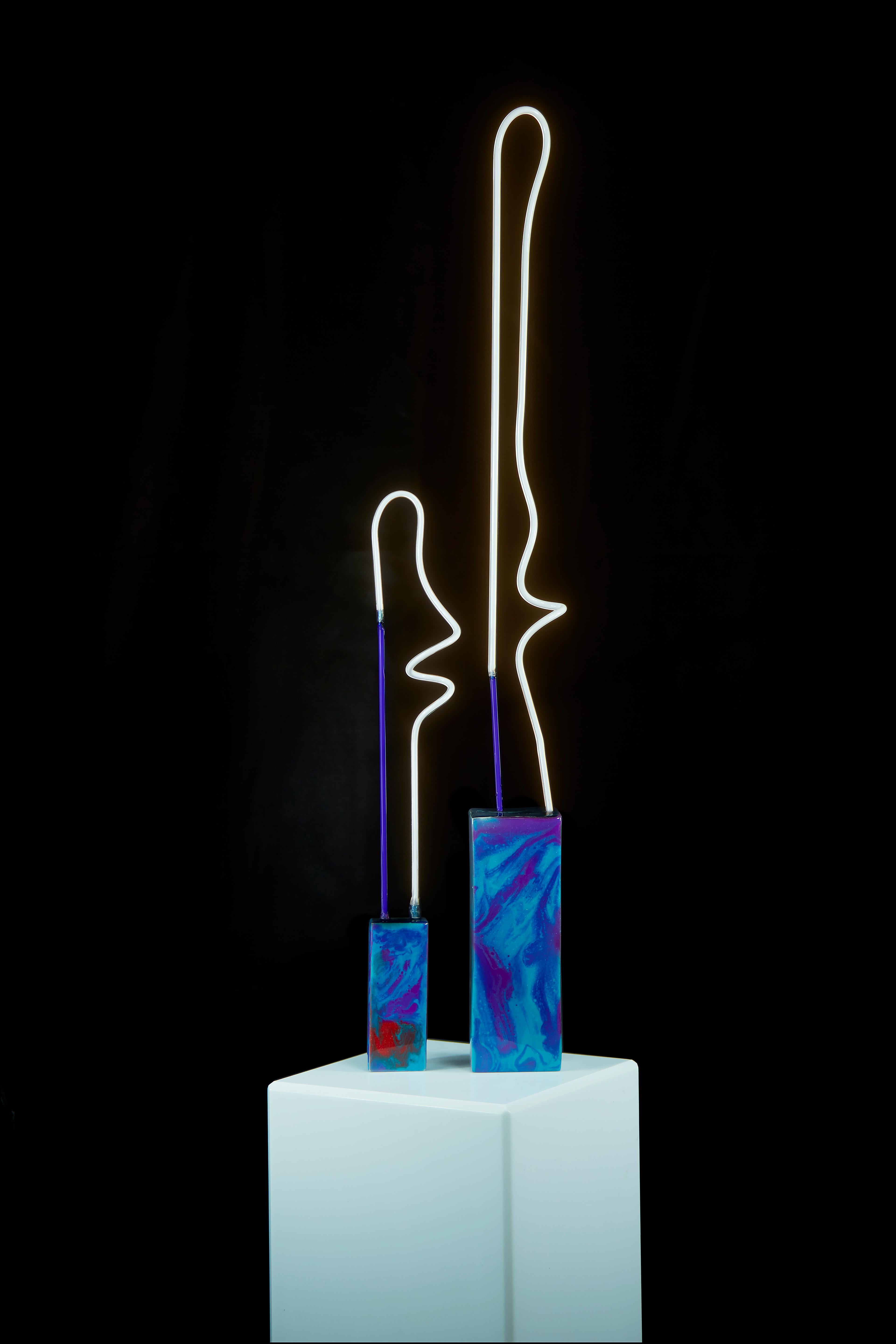 Each neon table lamp are a one of a kind abstract light sculpture. Each are signed dated and numbered. I always allow the glass to bend and move on its own when creating each piece. Unique in shape, character and design. I will deliver and install