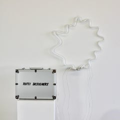 Múltiple de neón de Michelangelo Pistoletto, 1989