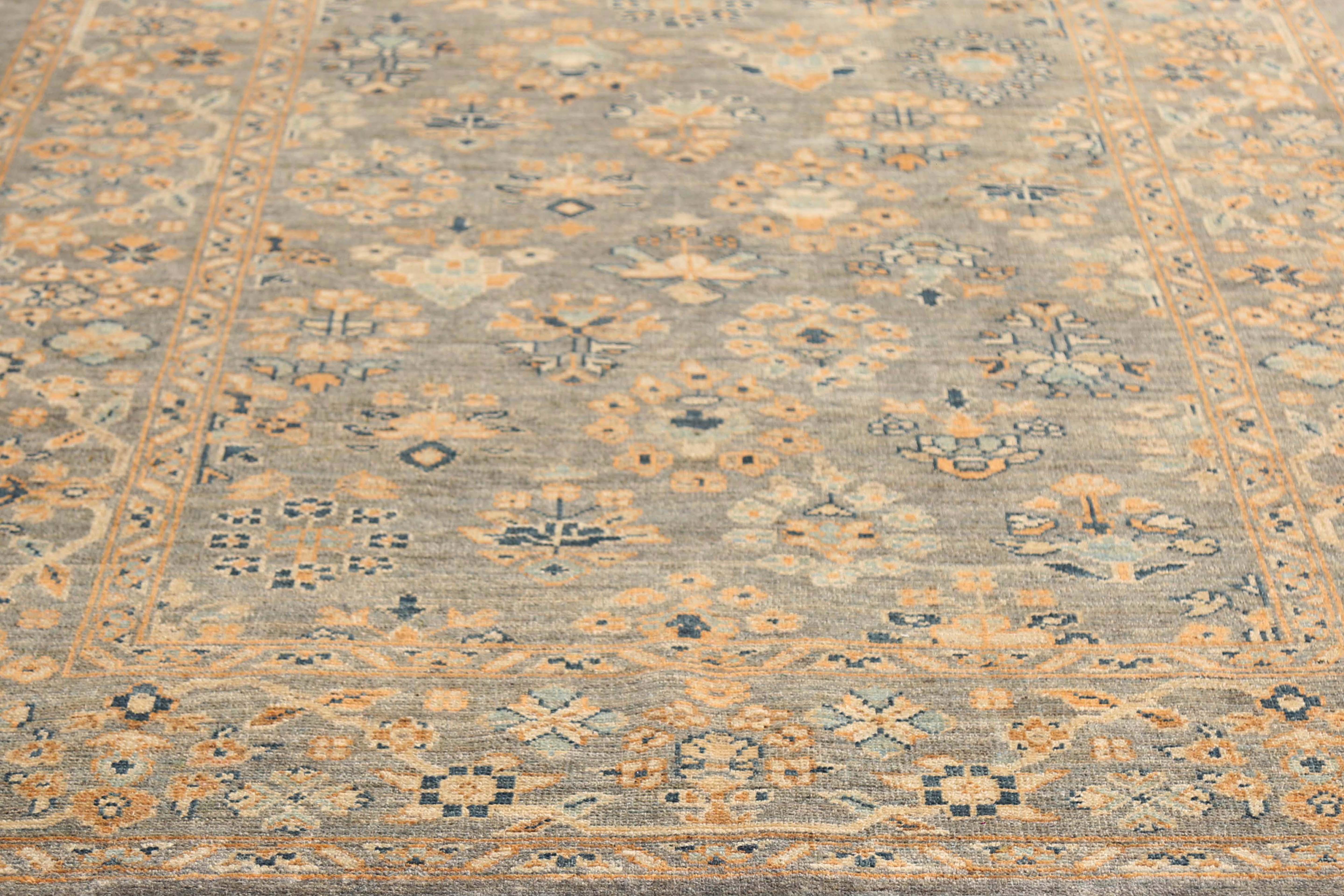 Introducing our stunning handmade Turkish Sultanabad rug, measuring 6'1'' by 9'8''. This exquisite rug features a dark brown and grey background, with a beautiful blend of light orange, blue, and navy colors incorporated into the traditional design.