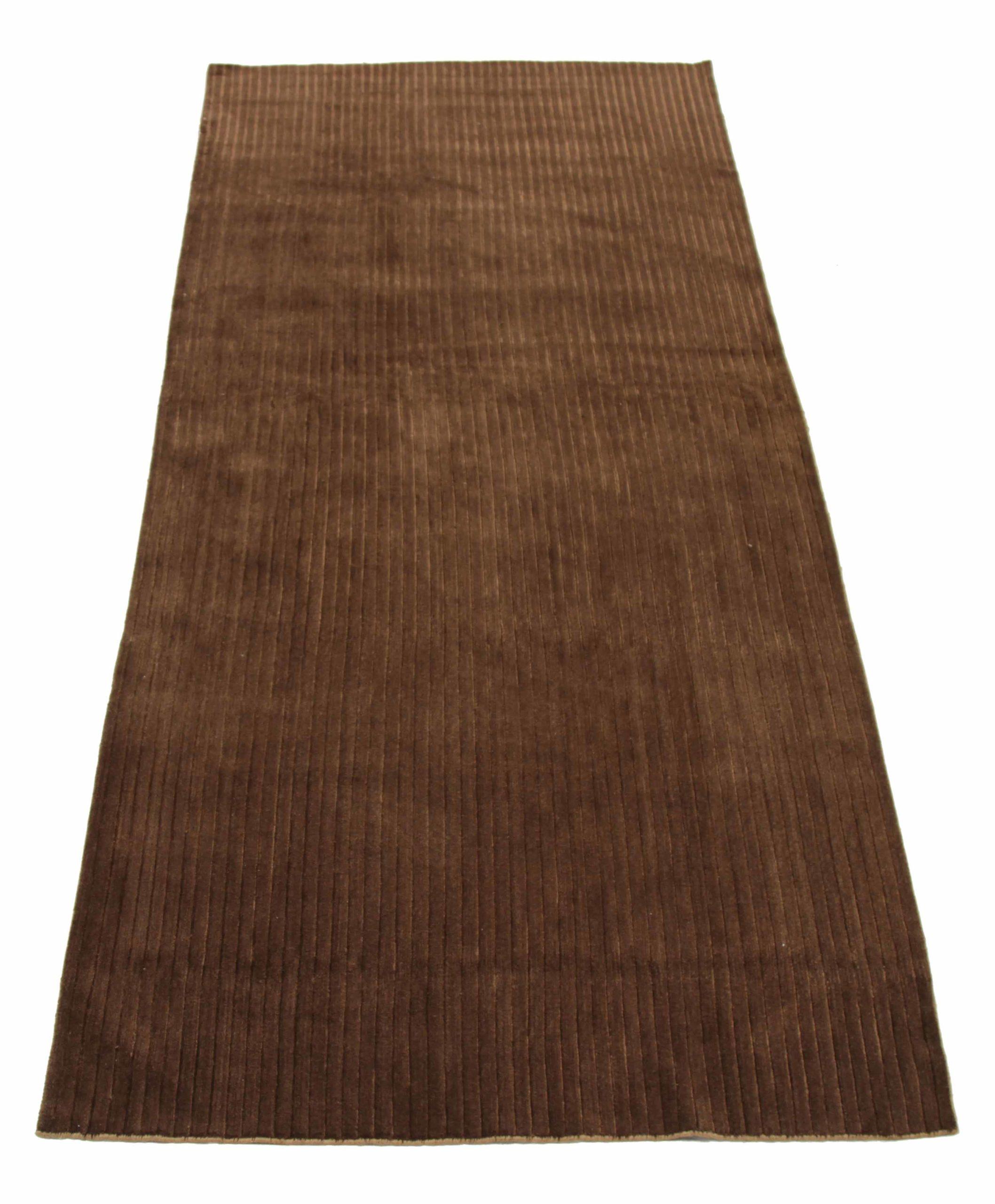 Discover the elegance of Nepal item featuring Area Rugs in Circa 1990. Designed with Wool and Brown, this exclusive design is perfect for enhancing your space.