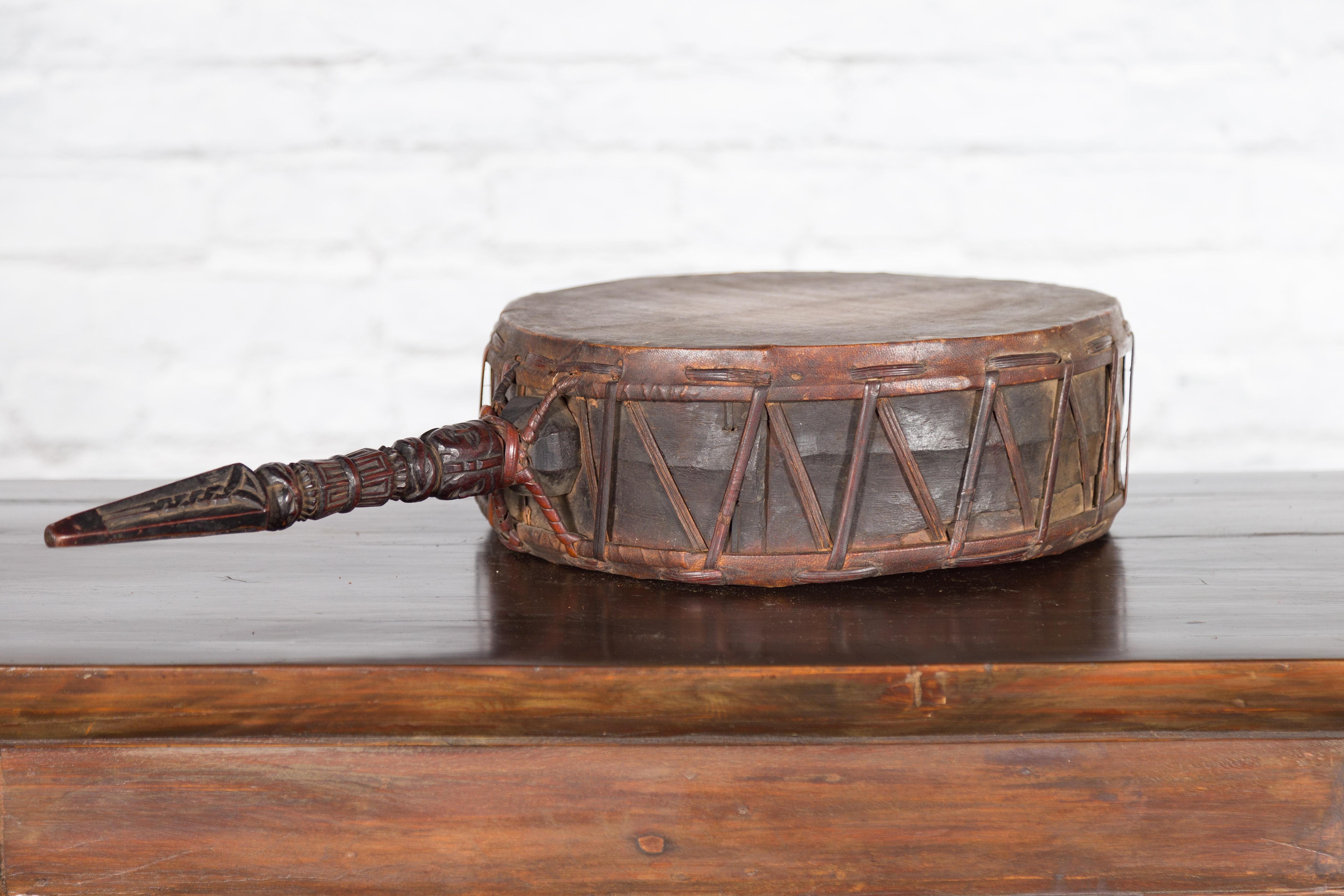 Nepalese Antique Leather Hand Drum with Carved Wooden Handle For Sale 4