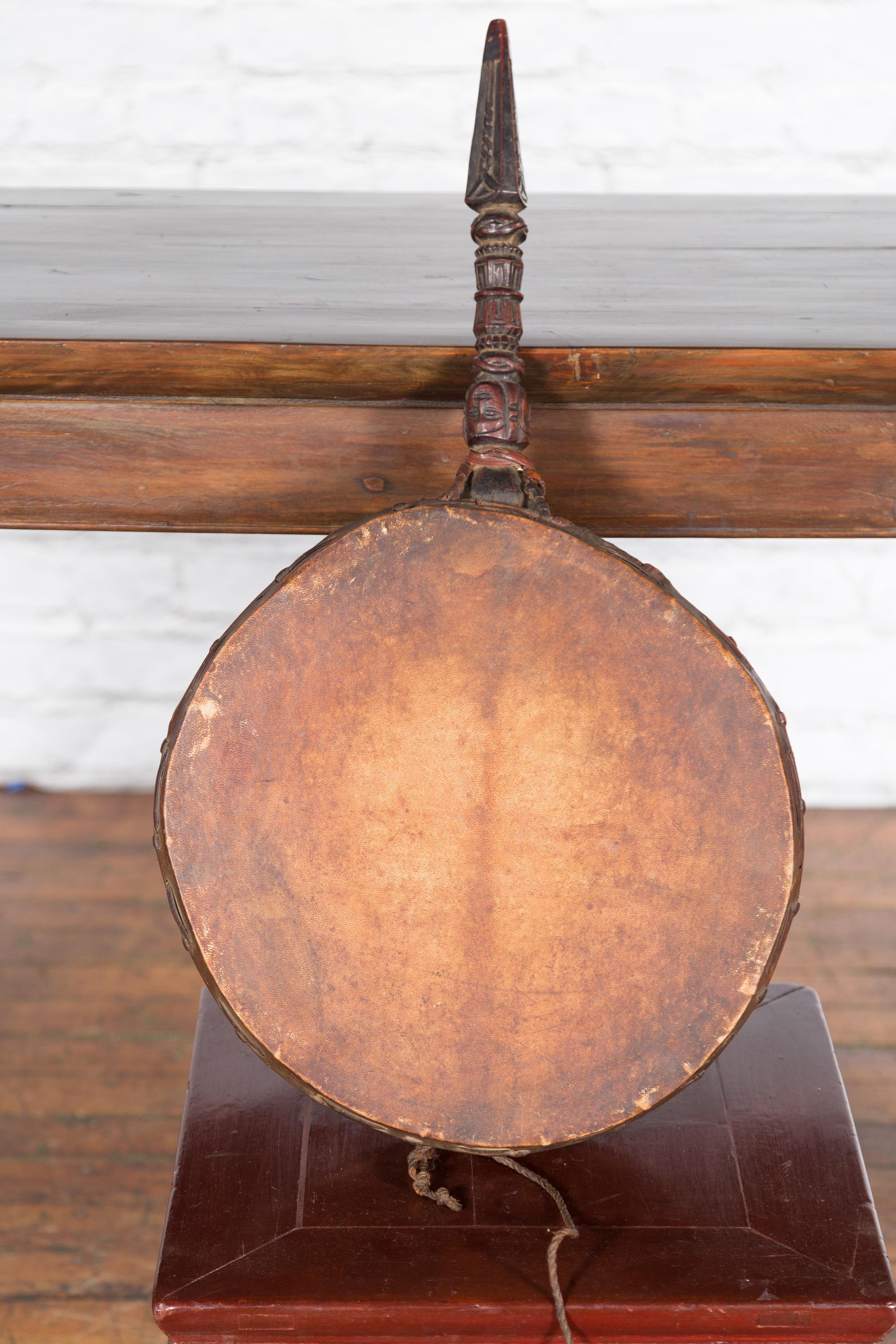 Nepalese Antique Leather Hand Drum with Carved Wooden Handle For Sale 5