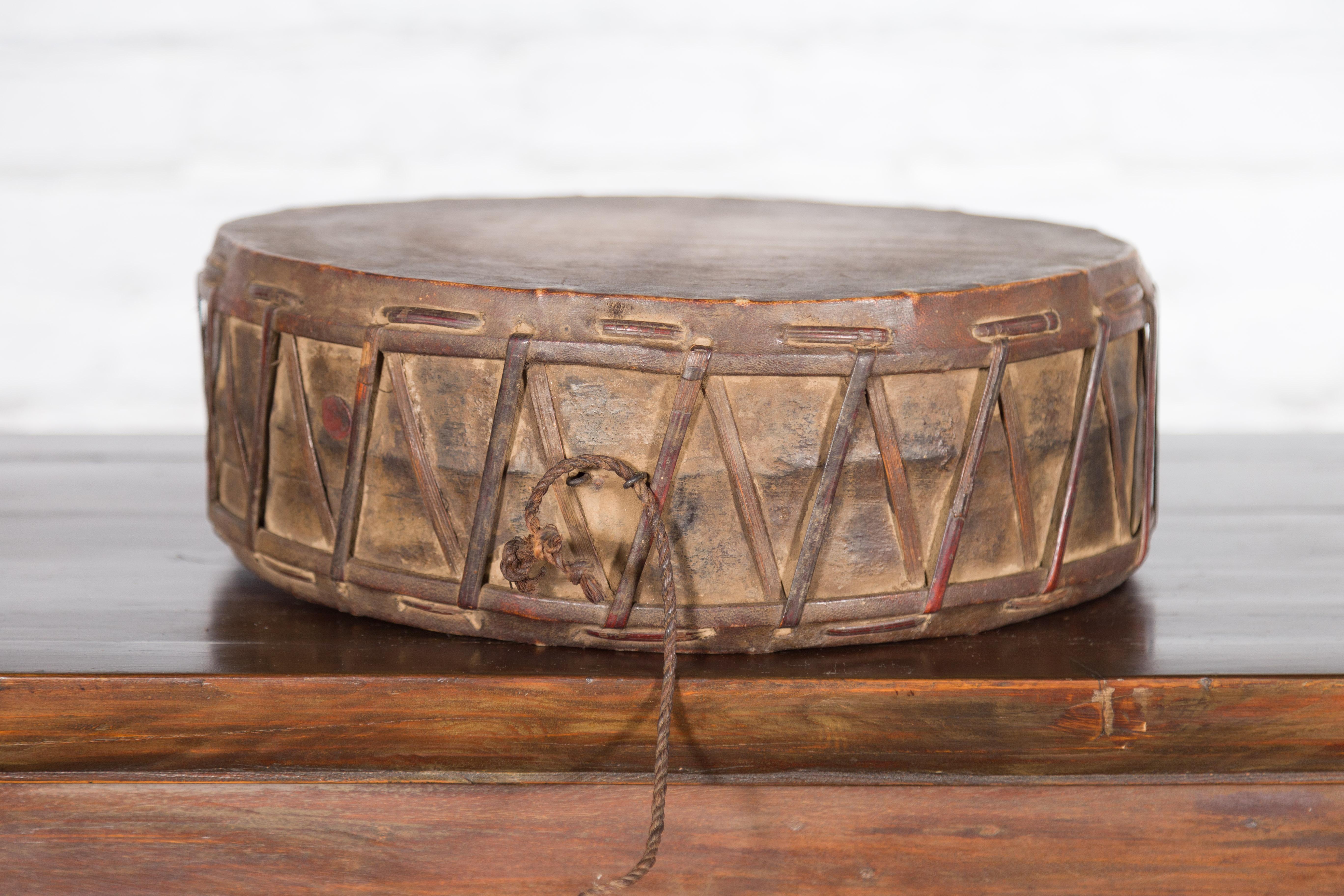 Nepalese Antique Leather Hand Drum with Carved Wooden Handle For Sale 1