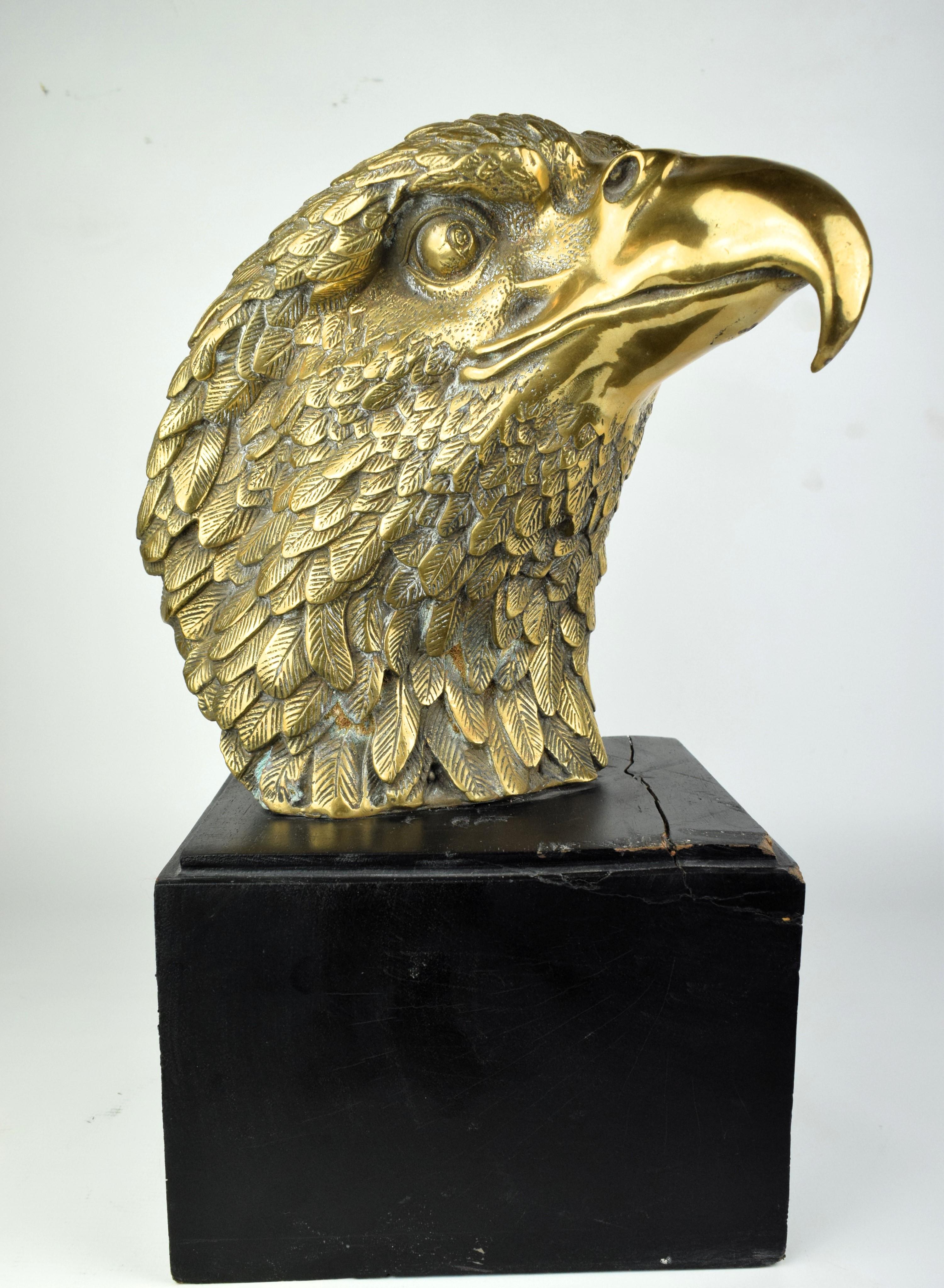 This brass eagle bust is a stunning and intricately crafted decorative sculpture of an eagle's head, made from brass. The eagle is a symbol of strength, freedom, and majesty, making it a popular subject for artistic representations. A brass eagle