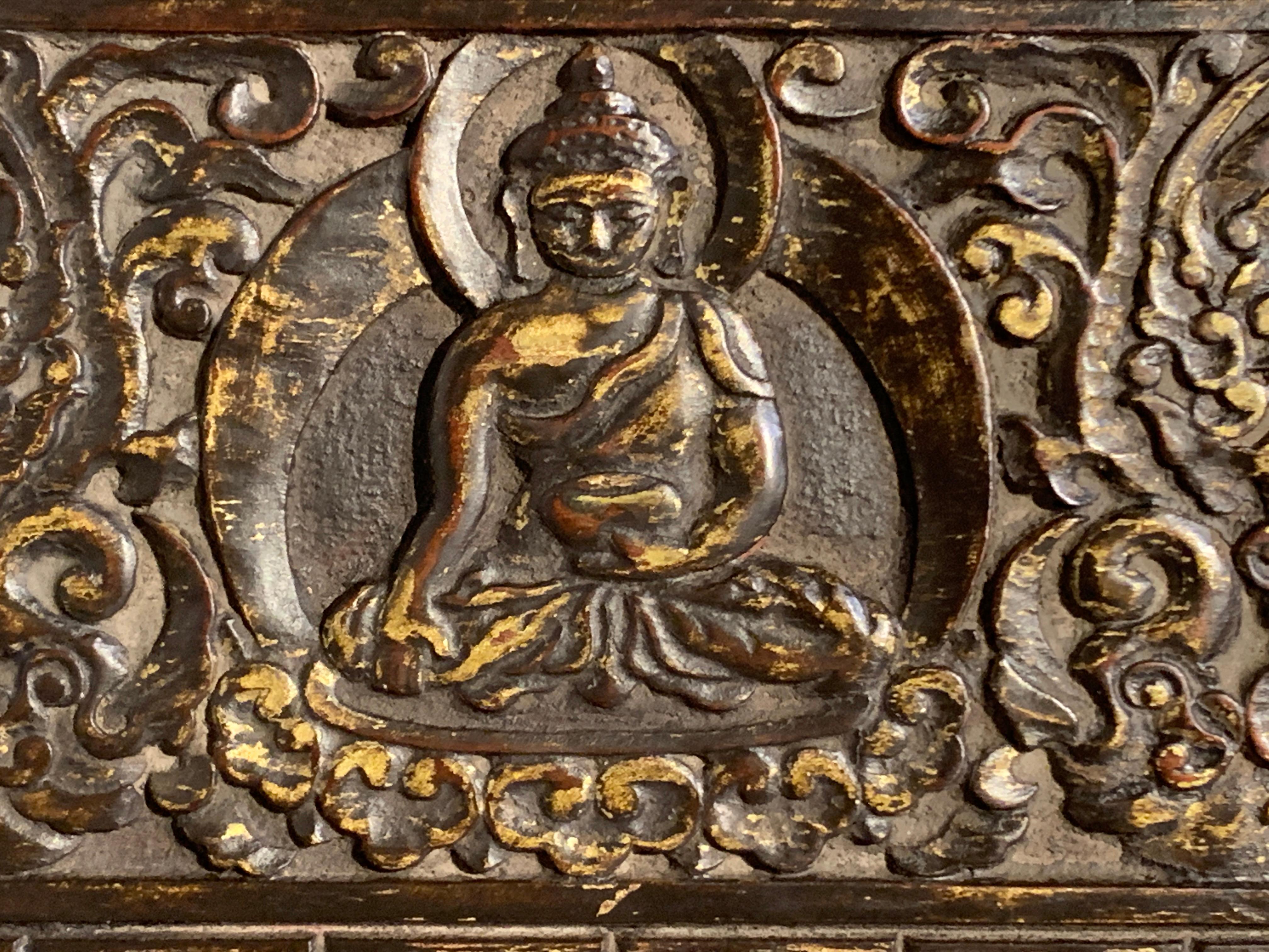 Hand-Carved Nepalese Carved and Painted Buddhist Manuscript Cover, 15th Century For Sale