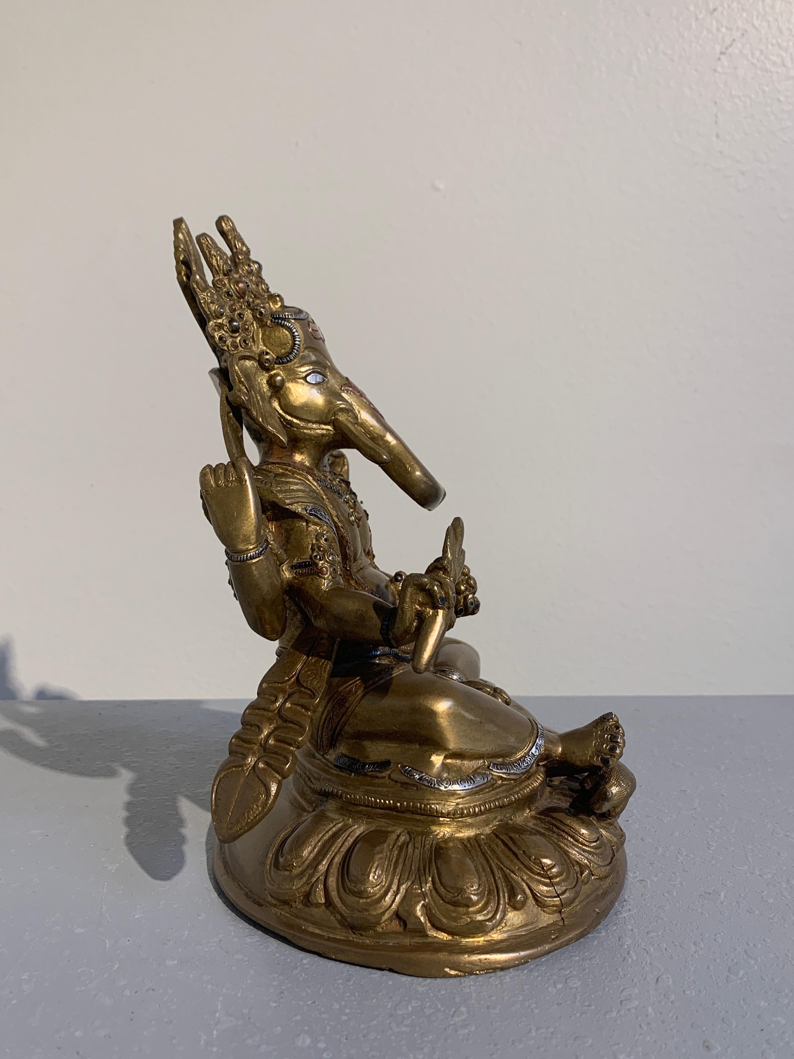 Nepalese Cast Copper Ganesha with Silver and Copper Inlay, Late 20th Century In Good Condition In Austin, TX