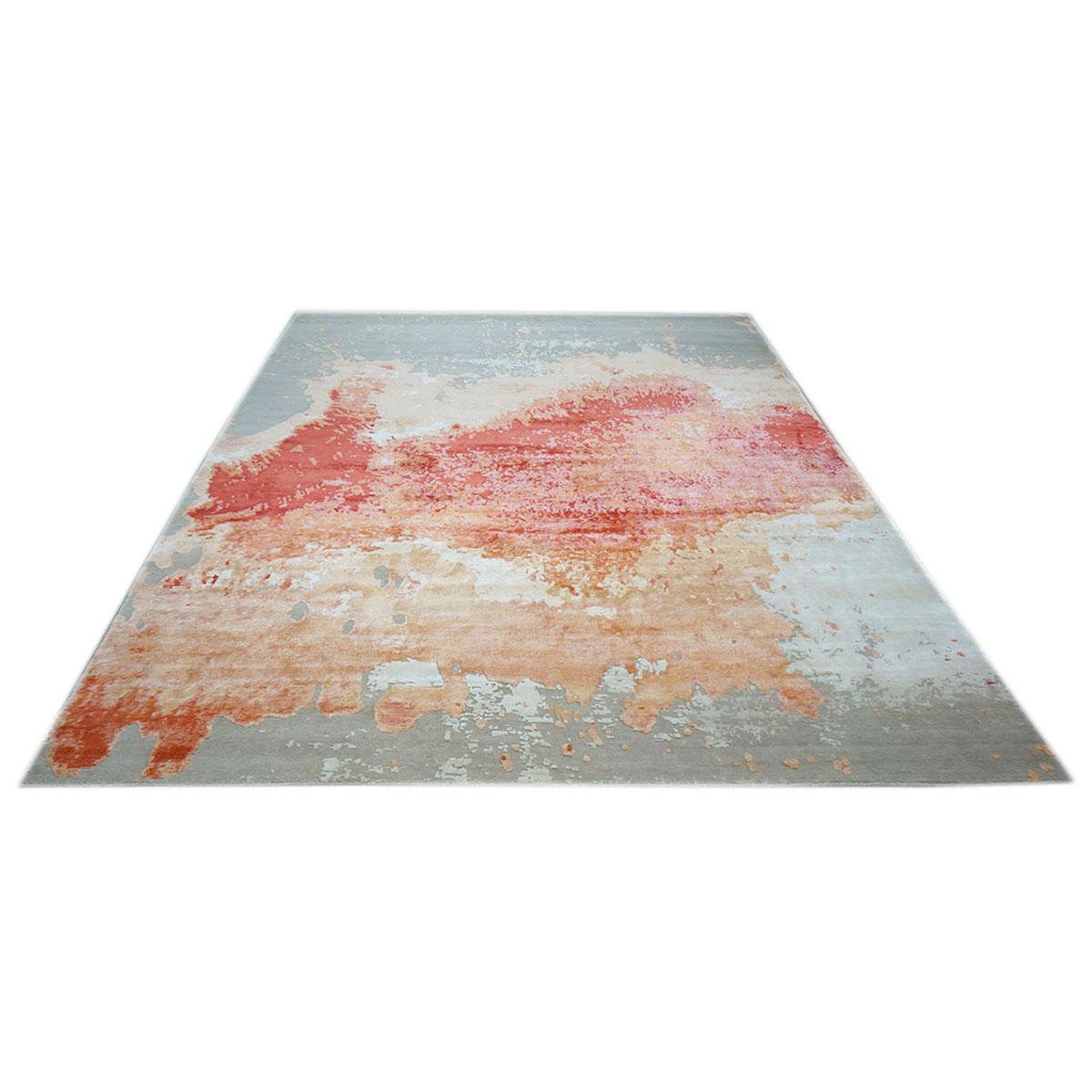 Ashly fine rugs presents a New Modern inspired wool & silk 9x12 grey, orange, & red handmade area rug with lustrous shiny fibers and a thick durable pile. This gorgeous collection has been designed by our in-house designer and handmade by the