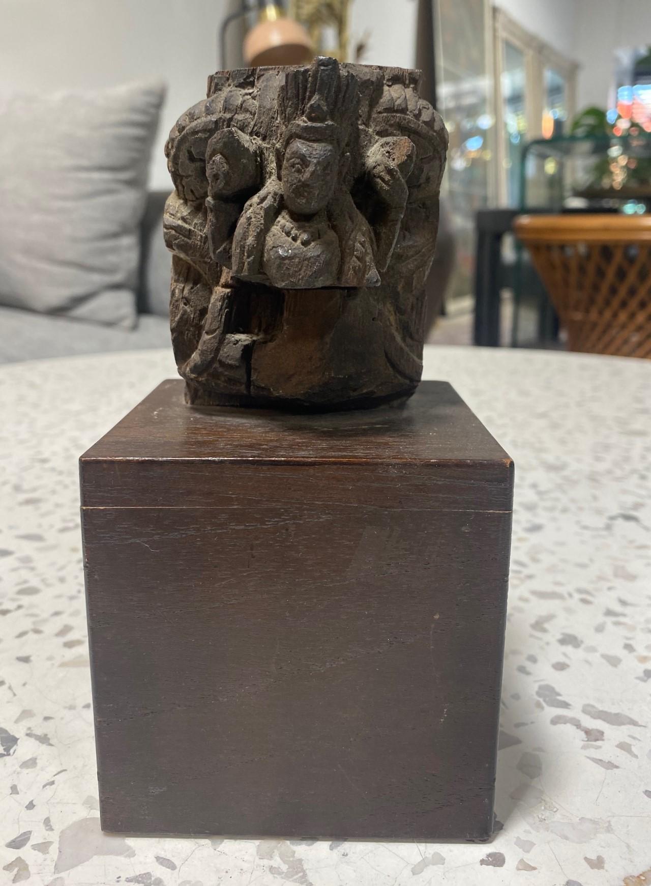 A wonderful Nepalese wood-carved deity sculpture of the Hindu God Vishnu - the god of preservation and the protector and restorer of dharma

This architectural ornament piece is hand-carved from a single piece of wood and likely came from a Hindu