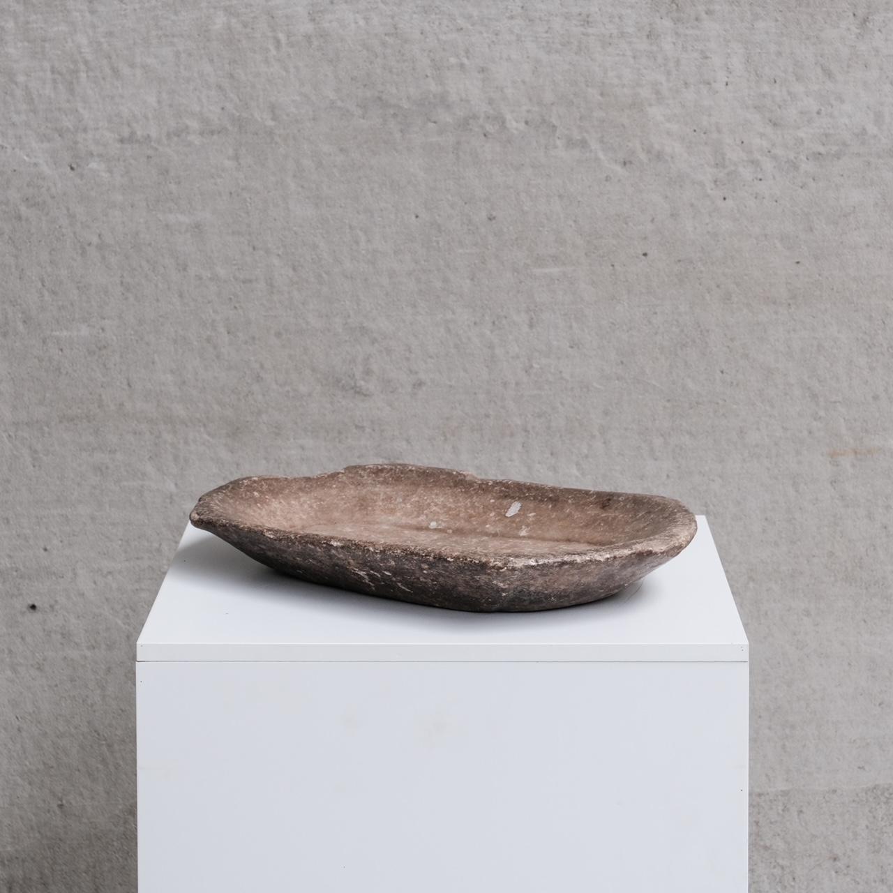 A simple wabi-sabi esque platter.

Nepal, c1960s.

A stone or marble of some form.

Very tactile, and functional.

Internal ref: 30/11/2023/020.

Good vintage condition, some scuffs and wear commensurate with age.

Location: Belgium