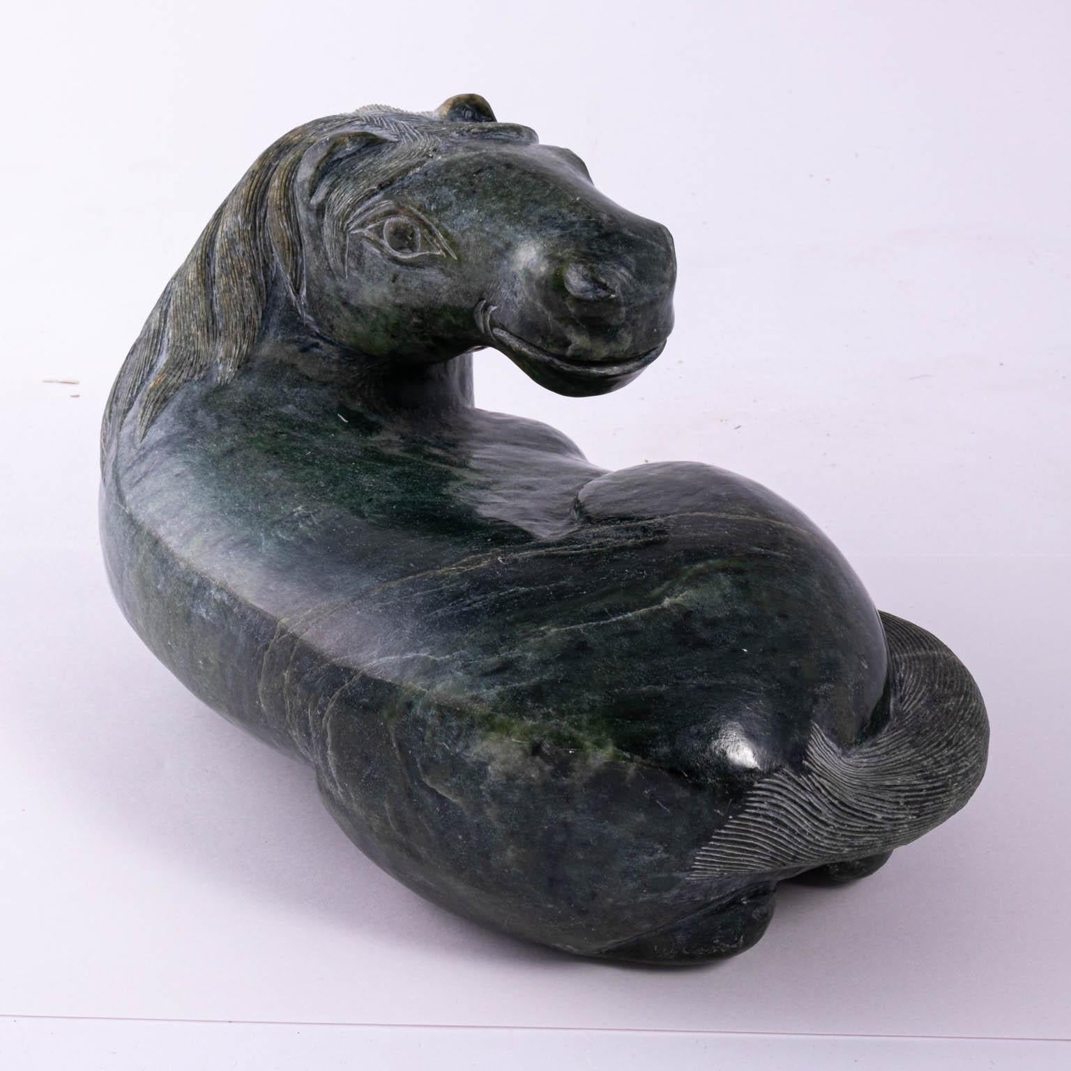 Hand carved recumbent horse. Nephrite Jade. Different Hues and Veins. Heavy. Oriental design, outstanding quality.