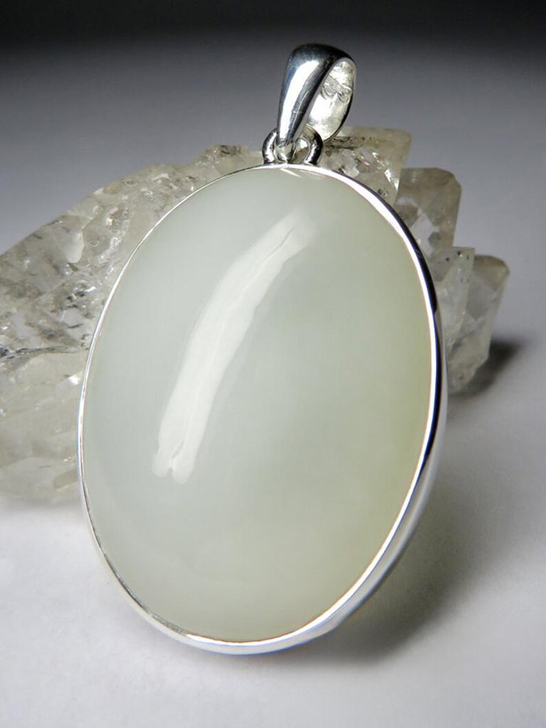 Silver pendant with natural Jade - Nephrite
gemstone weight - 42 carat 
gemstone size - 0.32 х 0.83 х 1.14 in / 8 х 21 х 29 mm
pendant weight - 11.20 grams 
