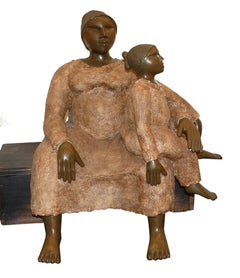  Woman With Child Sitting On The Bench 