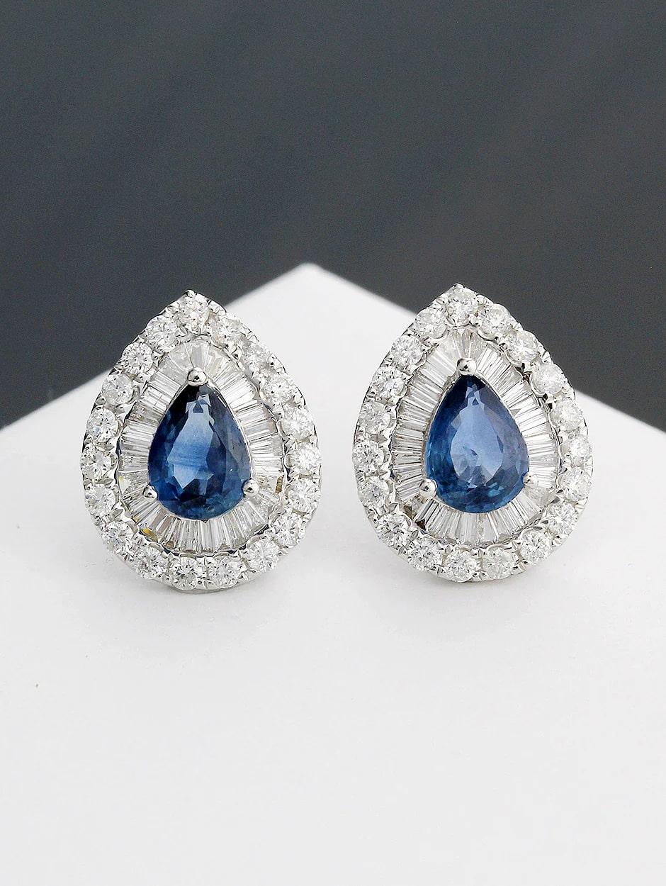 Tear drop design sapphire earring with diamond around, all with a high polish finish. Available in 18K White Gold.

Earring Information
Diamond Type : Natural Diamond
Metal : 18K
Metal Color : White Gold
Diamond Carat Weight : 0.96ttcw
Sapphire