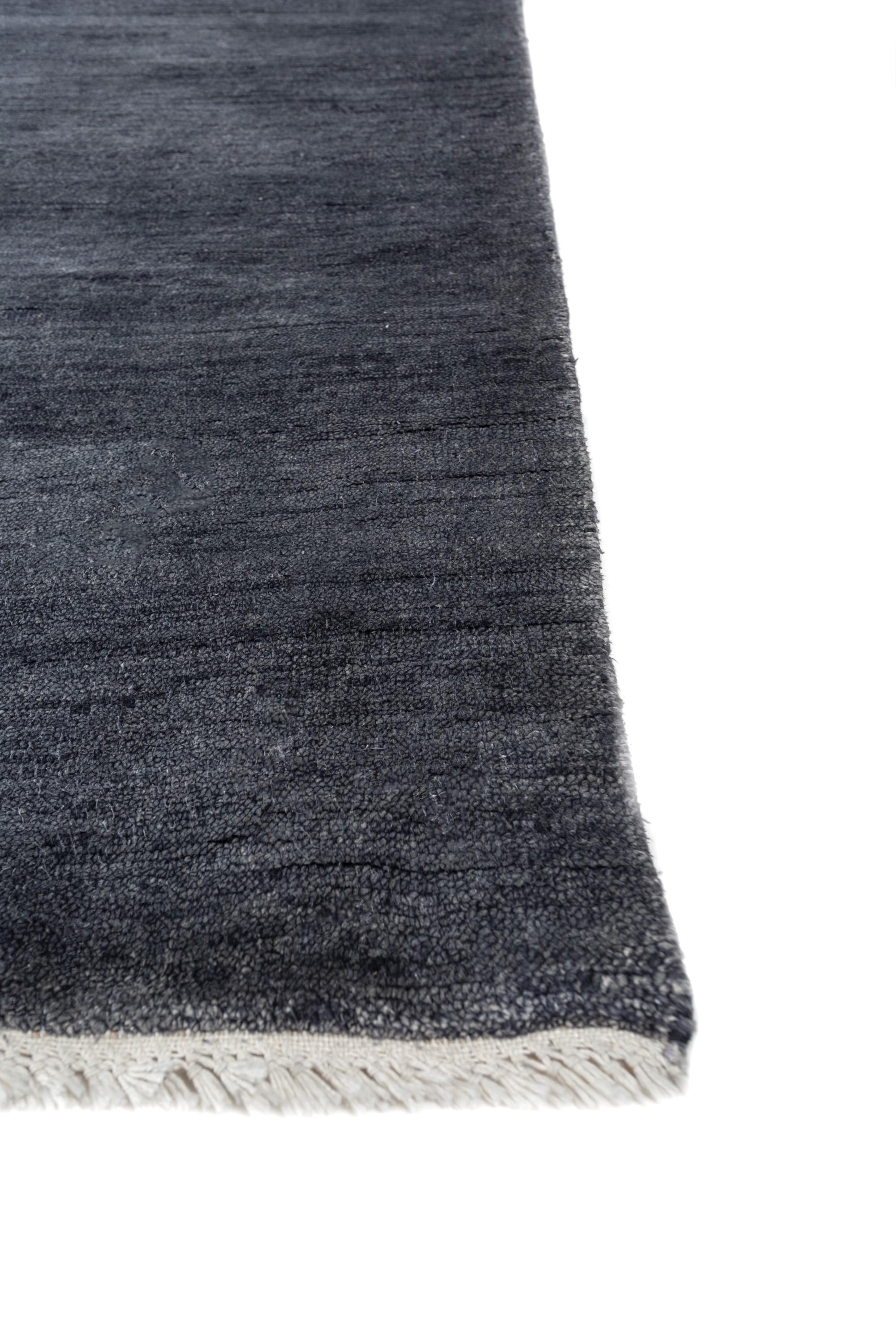 Dive into the mesmerizing allure of this luxury rug from our Manifest collection. Imagine the deep, rich hues of marine blue creating a gradient of flowy serenity, evoking the calmness of the open sea right in the heart of your home. One can find