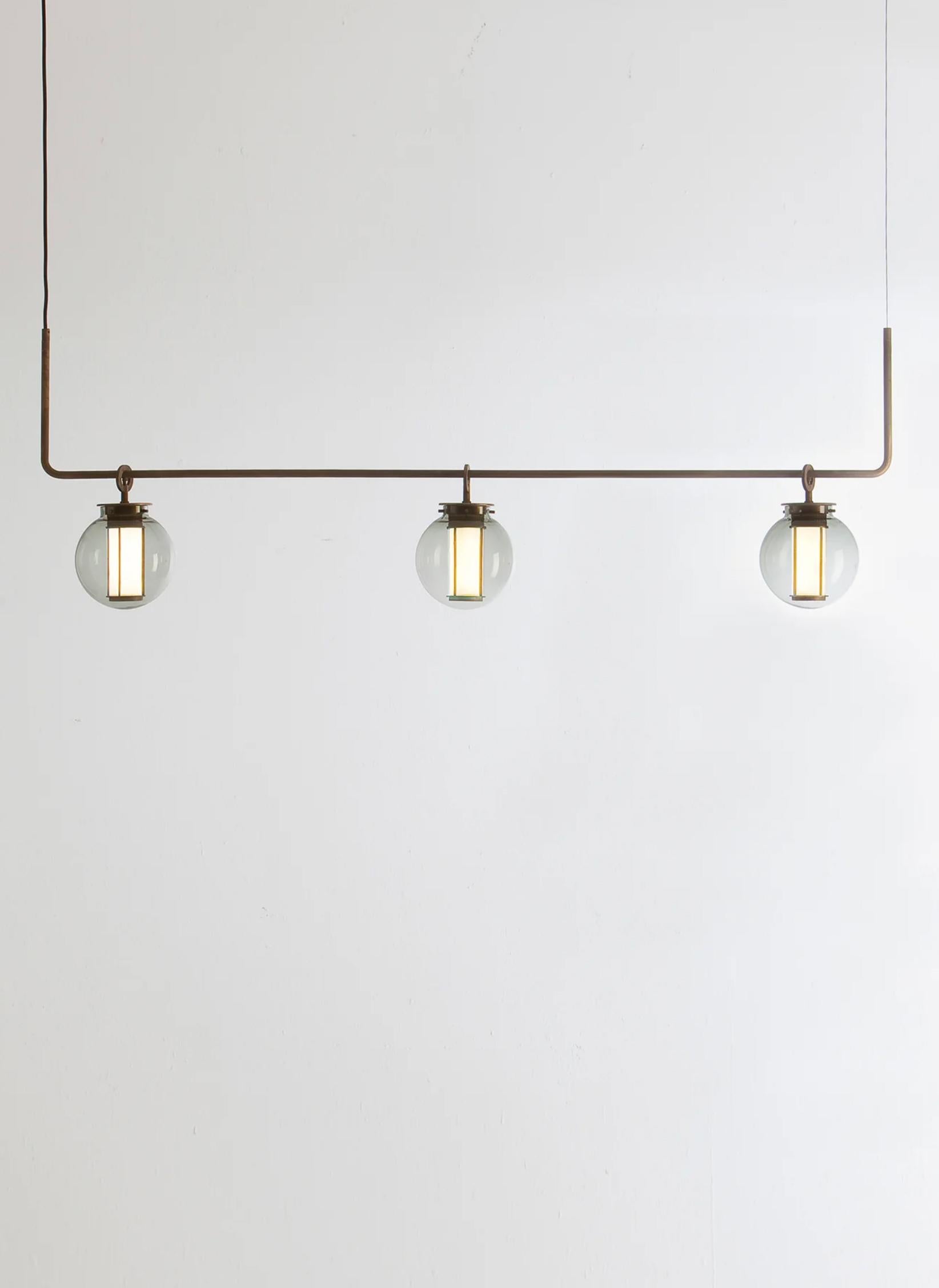 Neri and Hu Bai T Chandelier III Suspension Lamp For Parachilna

This collection is inspired by traditional Chinese lanterns. This version however, is a sophisticated one. Made by an aged bronze metallic structure and a meticulously hand-blown