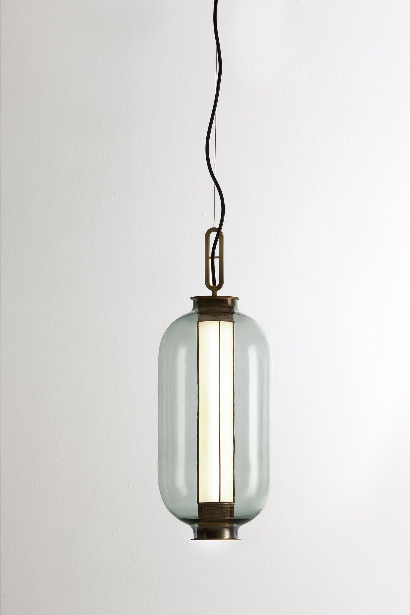 BAI T BA BA

Suspension lamp, model BAI T BA BA, designed by Neri & Hu in 2014. 
Manufactured by Parachilna. 

This collection is inspired by traditional Chinese lanterns. This version however, is a sophisticated one. Made of an aged bronze metallic