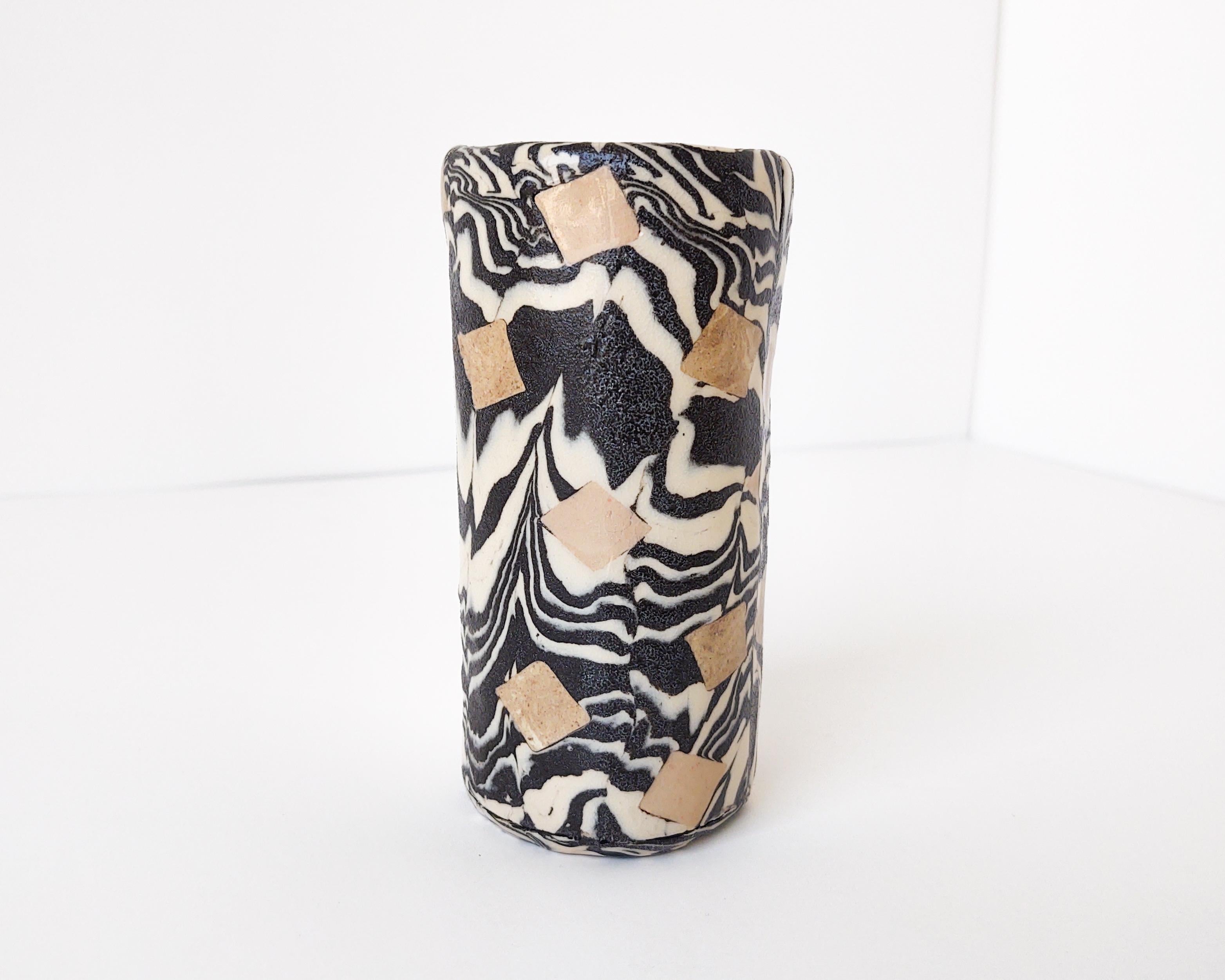 Handmade nerikomi vase with three different clays. Black and white zebra stripes interrupted with beige square inlays. Made and fired in Los Angeles by Fizzy Ceramics in 2020. Glazed clear on the outside and inside. Fired to cone 5 in oxidation,
