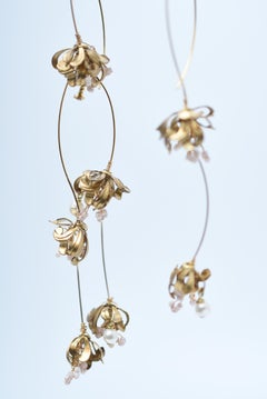 boucle d'oreille mobile nerine  Pièces de joaillerie vintage des années 1970