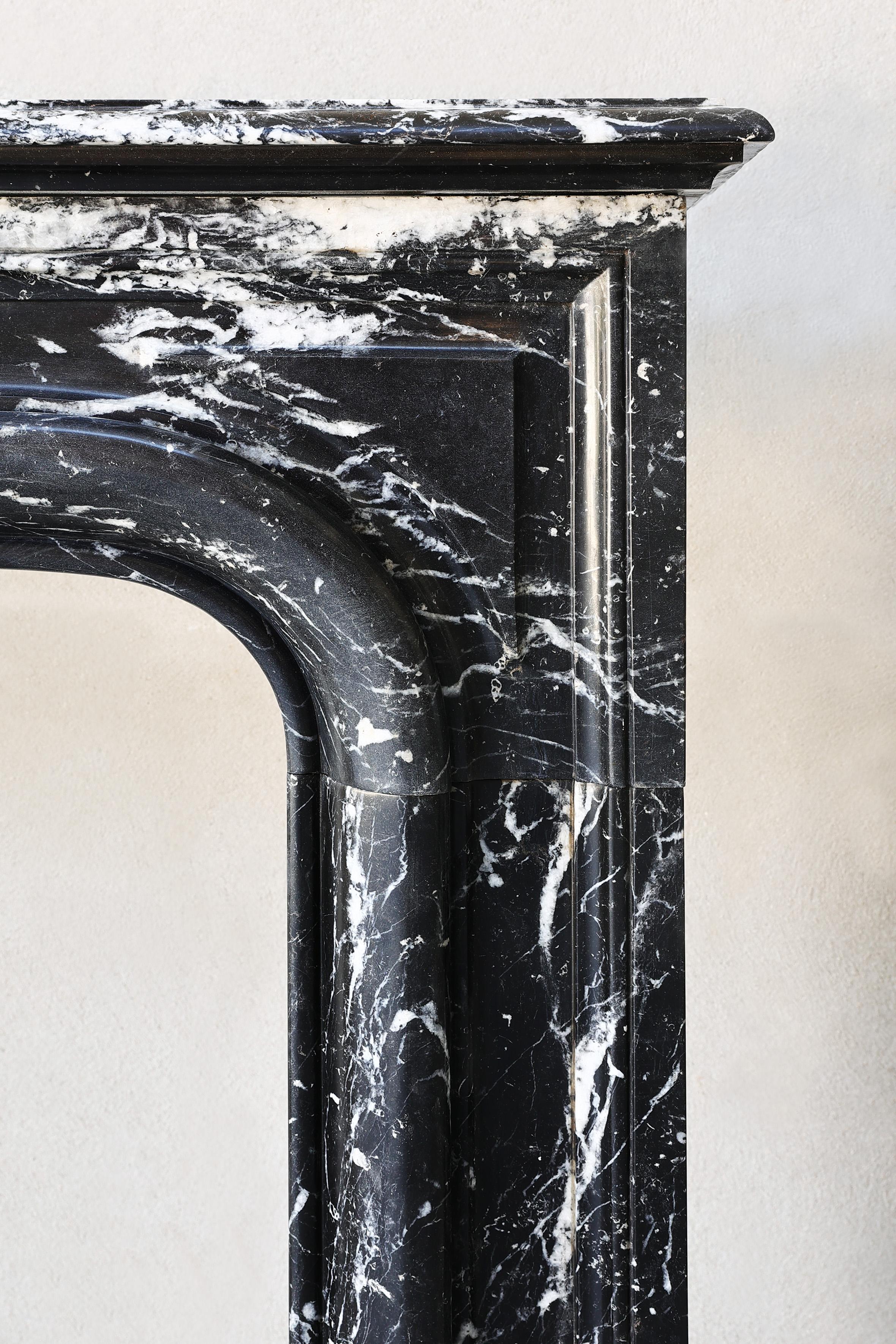 Nero Marquina marble fireplace from the 19th century in style of Louis XIV 1