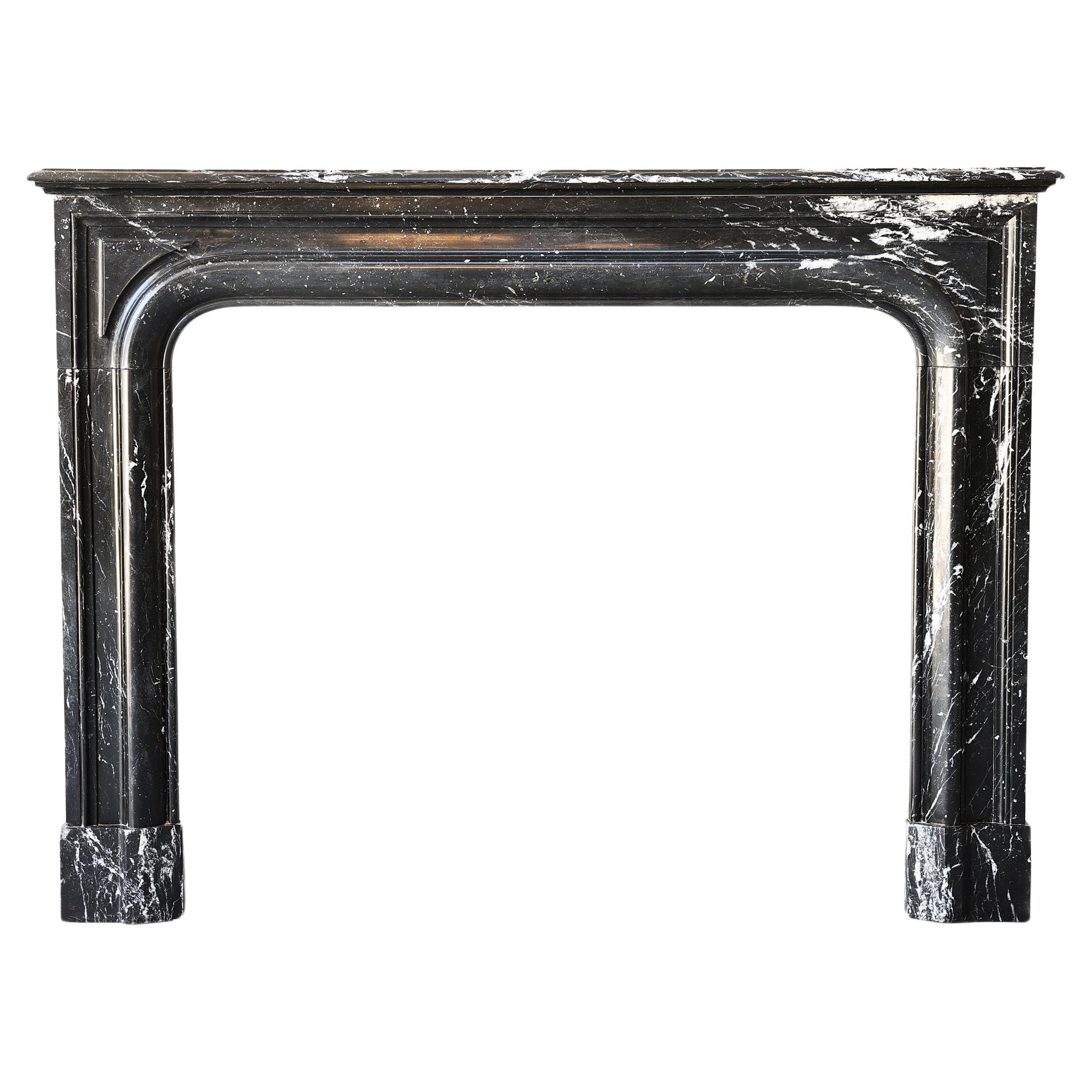 Nero Marquina marble fireplace from the 19th century in style of Louis XIV