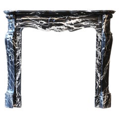 Nero Marquina marble fireplace in the Style of Pompadour from the 19th Century