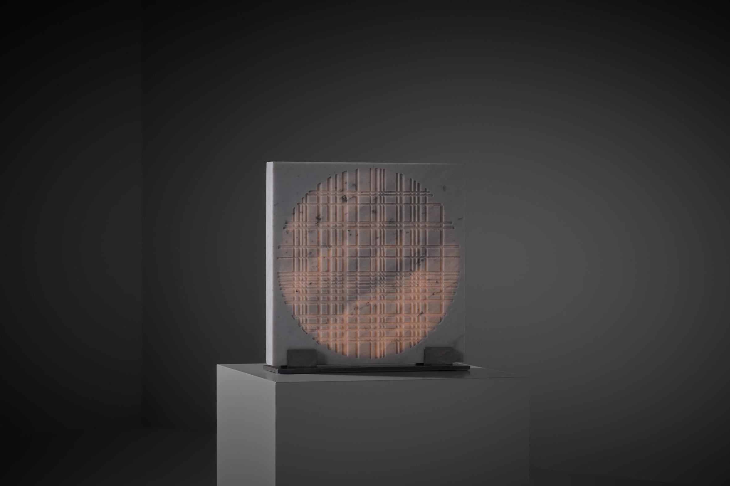 Rare 'C9 105 LP' marble light sculpture by Nerone & Patuzzi for Forme e Superfici, Italy 1970s. The lamp is crafted out of solid Carrara marble showing an artistic engraved graphic line pattern, illuminated from the inside creating an artistic and