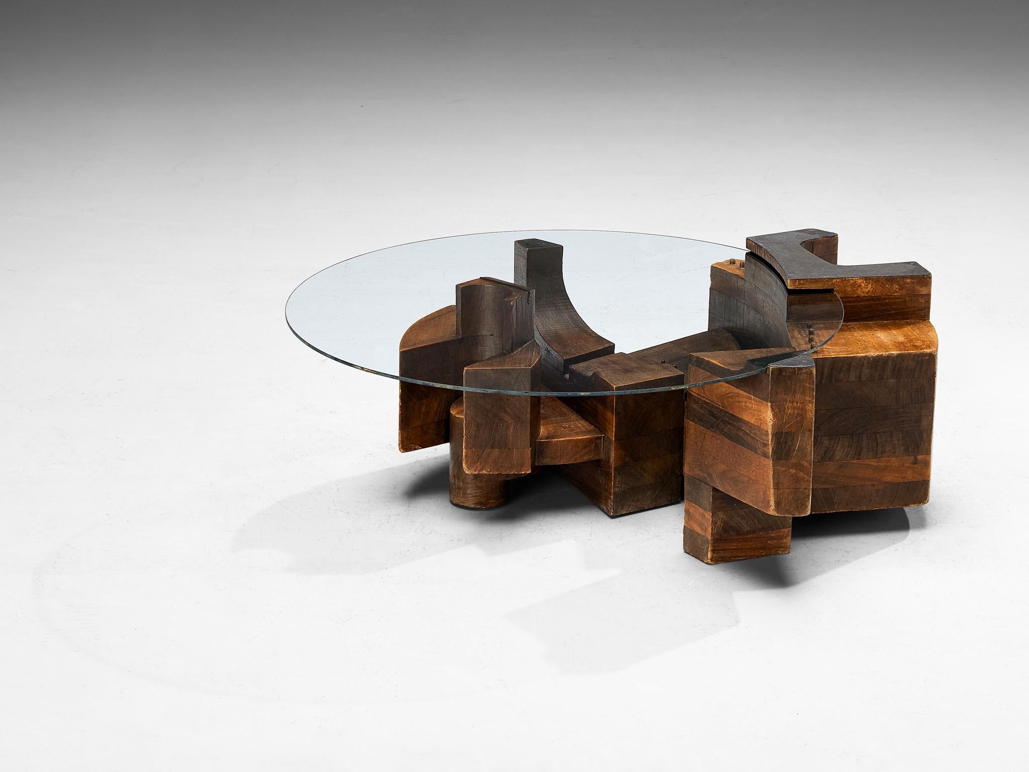 Nerone & Patuzzi for Gruppo NP2, coffee table, wood, glass, iron, Italy, 1970s

Designed by the Italian duo Nerone and Patuzzi, this unique coffee table is certainly a work of art in its own right. The base consists of an asymmetrical layout of