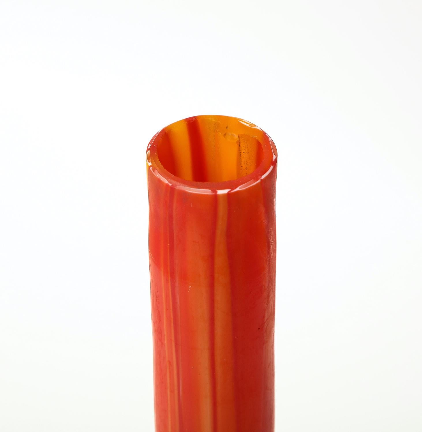 Blown glass. Bottle form sculpture of vibrantly colored opaque glass and a great scale. This object does not have a bottom, does not hold liquid & is purely a sculpture.