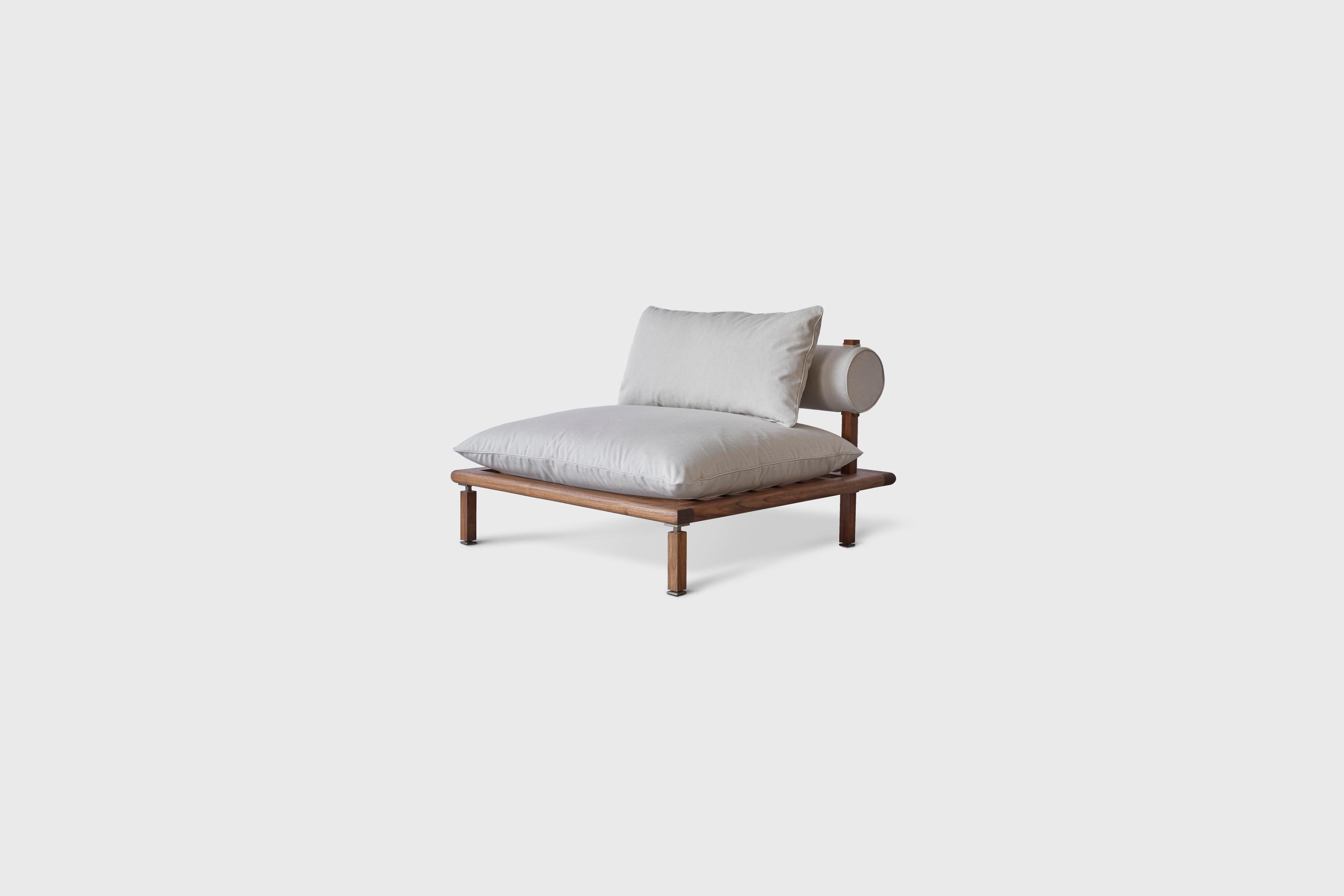 Nerthus sofa
Modular sofa in teak frame and Champaign Stainless Steel Details
Designer - Alexander Diaz Anderson 

Dimensions: 
BACK MODULE: 
L 108.5cm/42.7”
W 108.5cm/42.7”
H 71.1cm/27.9”
Seat height 40.0cm/15.7”

CHAISE MODULE:
L 108.5cm/42.7”
W