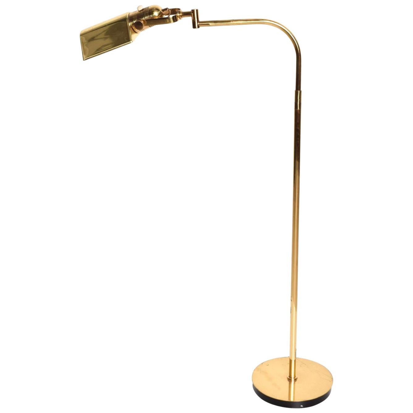 Pharmacy Reading Floor Lamp Brass by NESSEN Studios Bronx New York
Articulated shade-diffuser can be positioned in almost any desired position. Height is adjustable.
Stamped underneath with maker's label.
Sculptural neck.
43.5 tall x 22.5 D x. 9.5 W